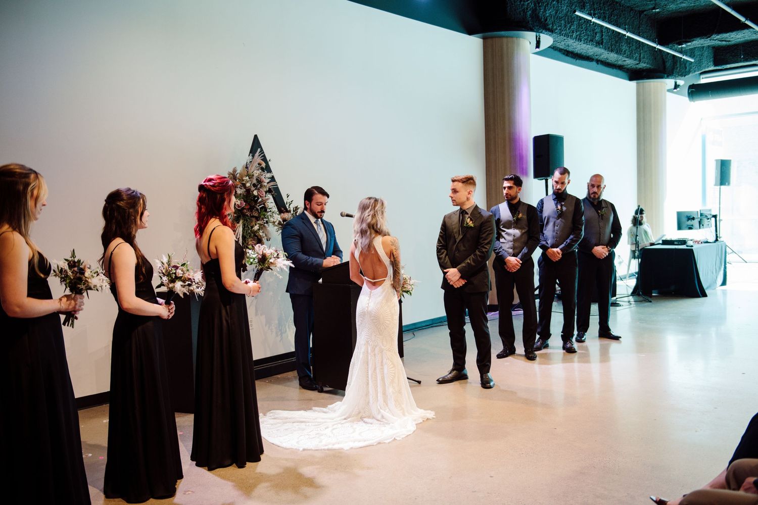 bride and groom at altar
