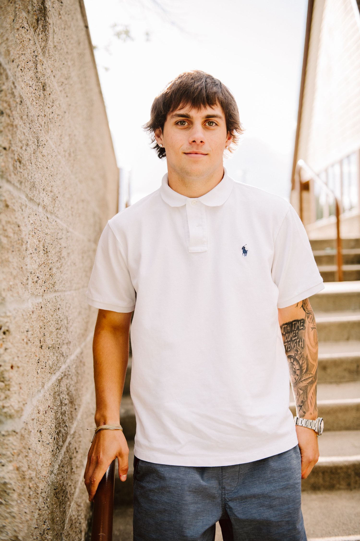 high school senior guy on stairs