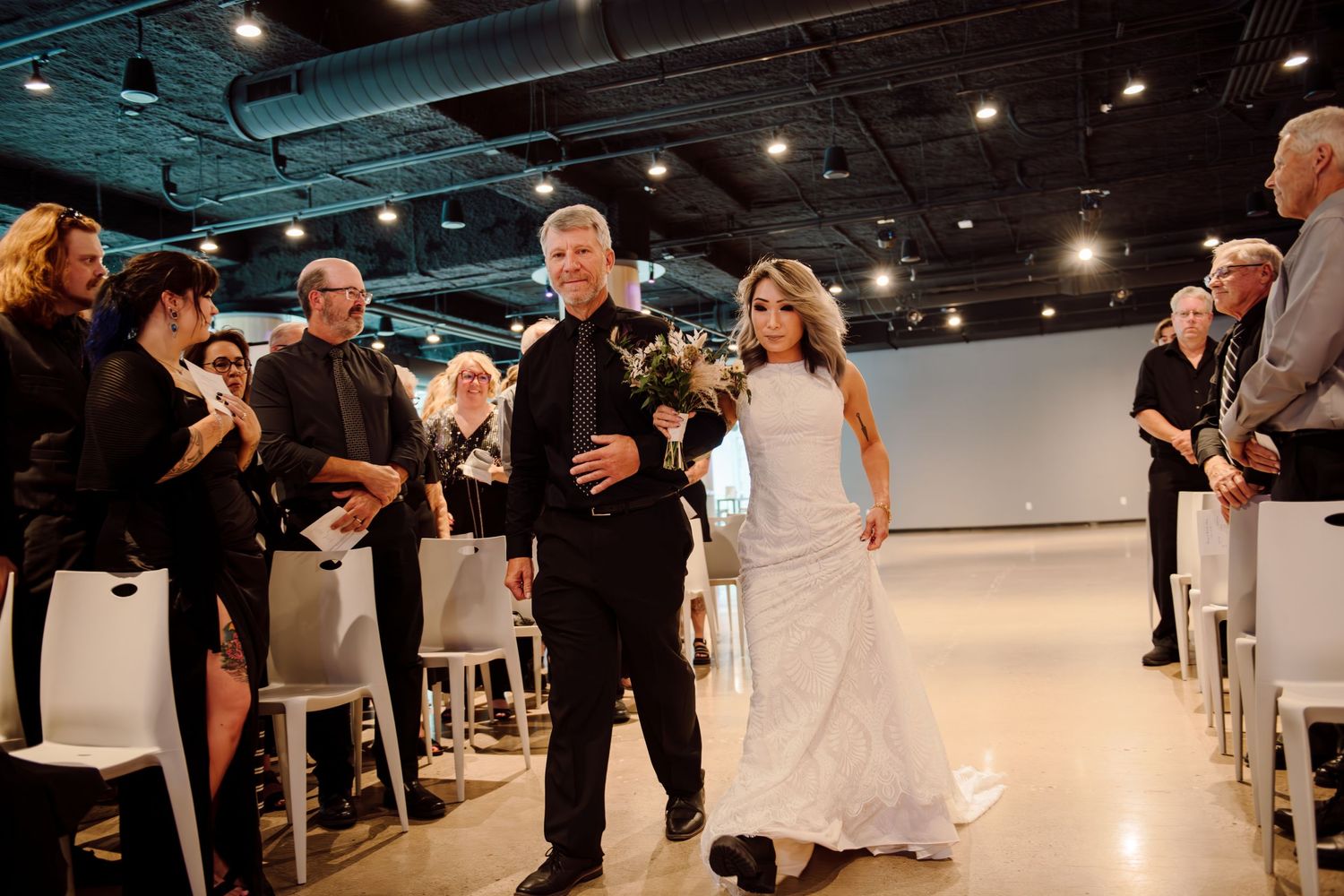 bride and groom walking down aisle