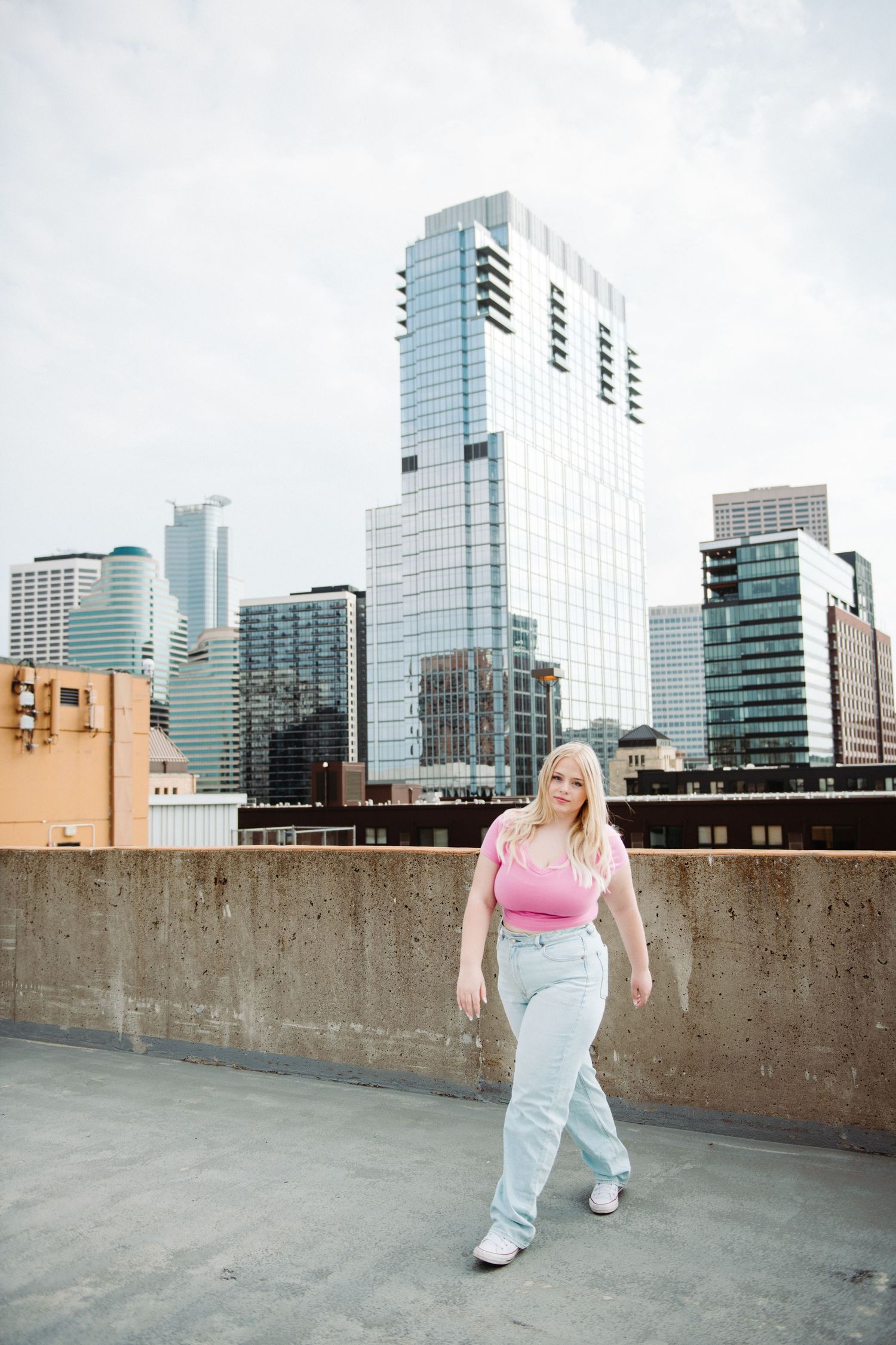 high school senior girl pictures on rooftop in minneapolis