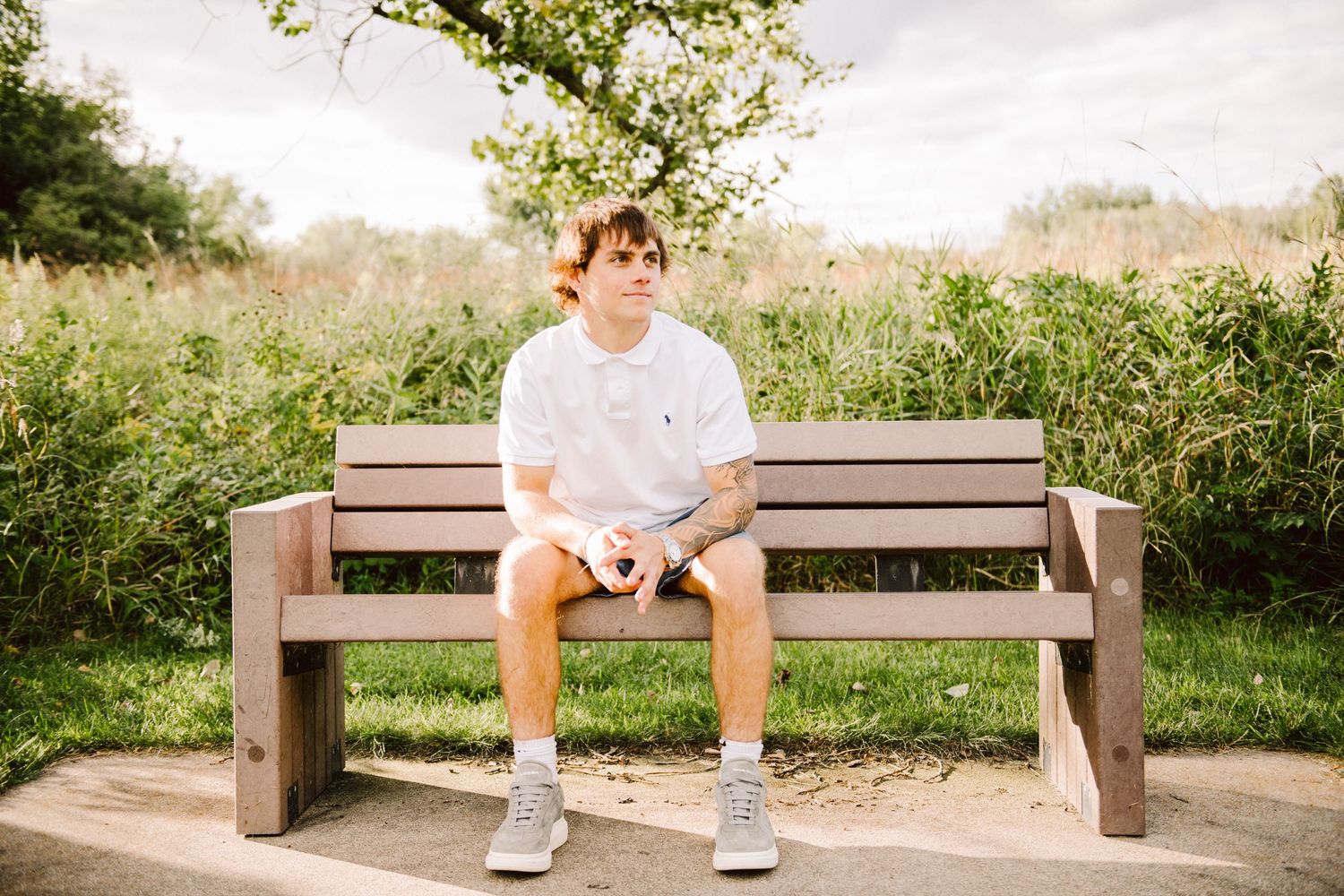 high school senior guy on bench