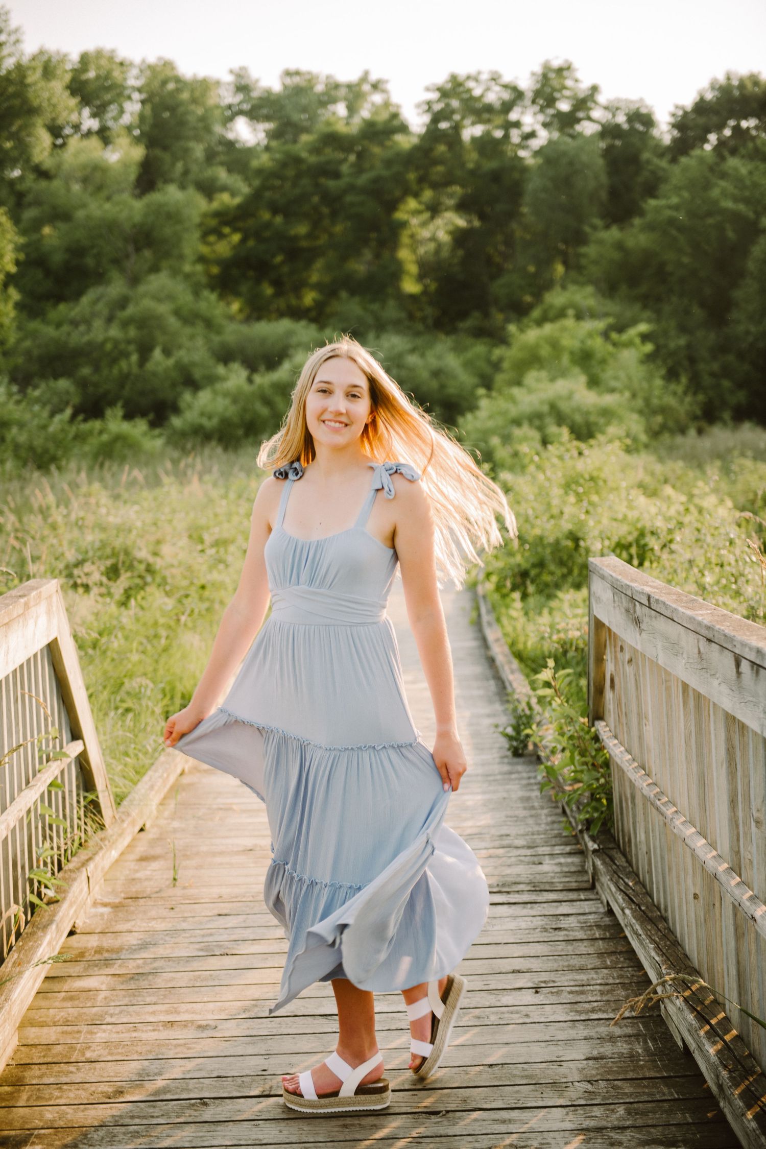 high school senior girl pictures on a walking bridge