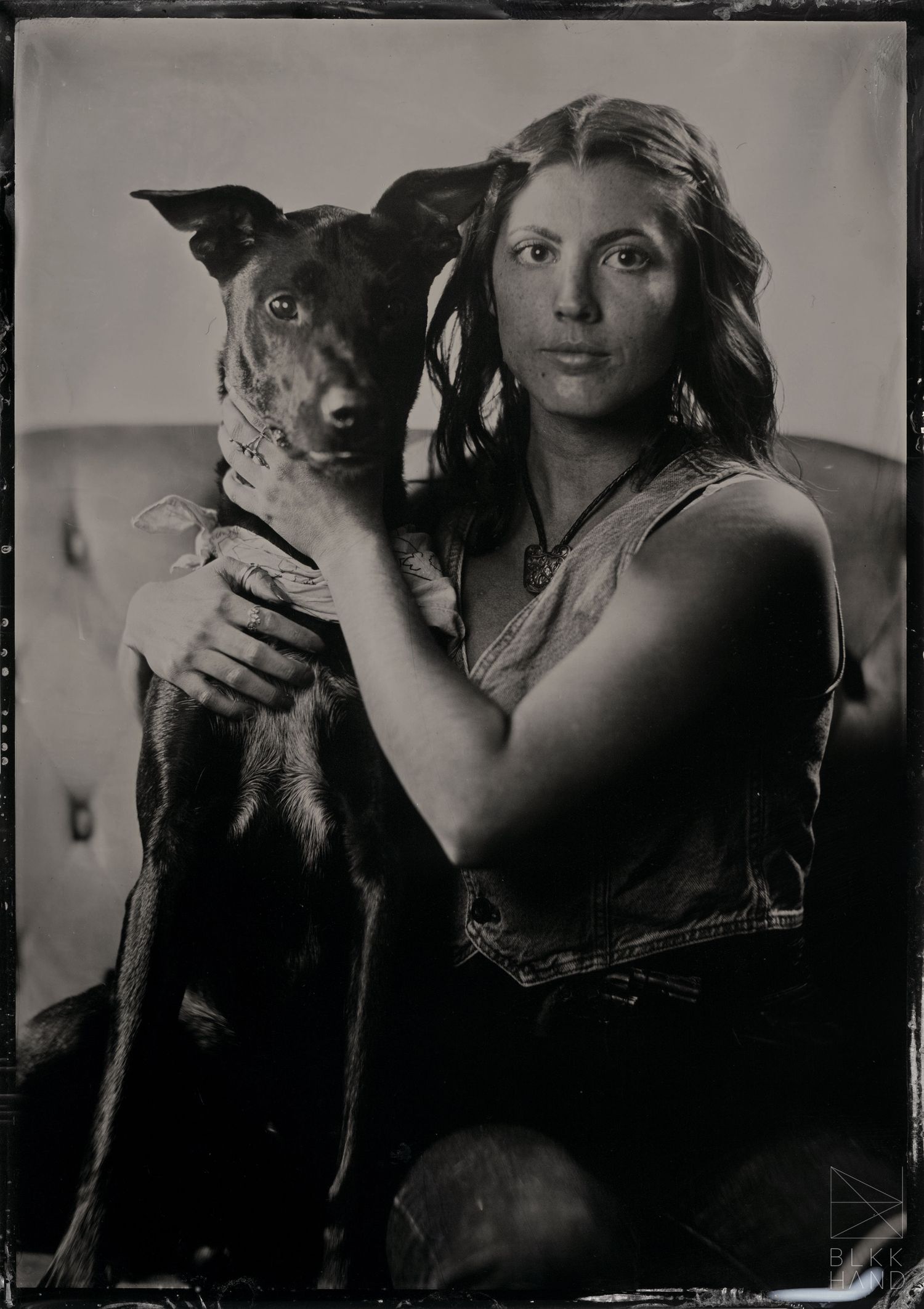 tintype photo of girl and dog