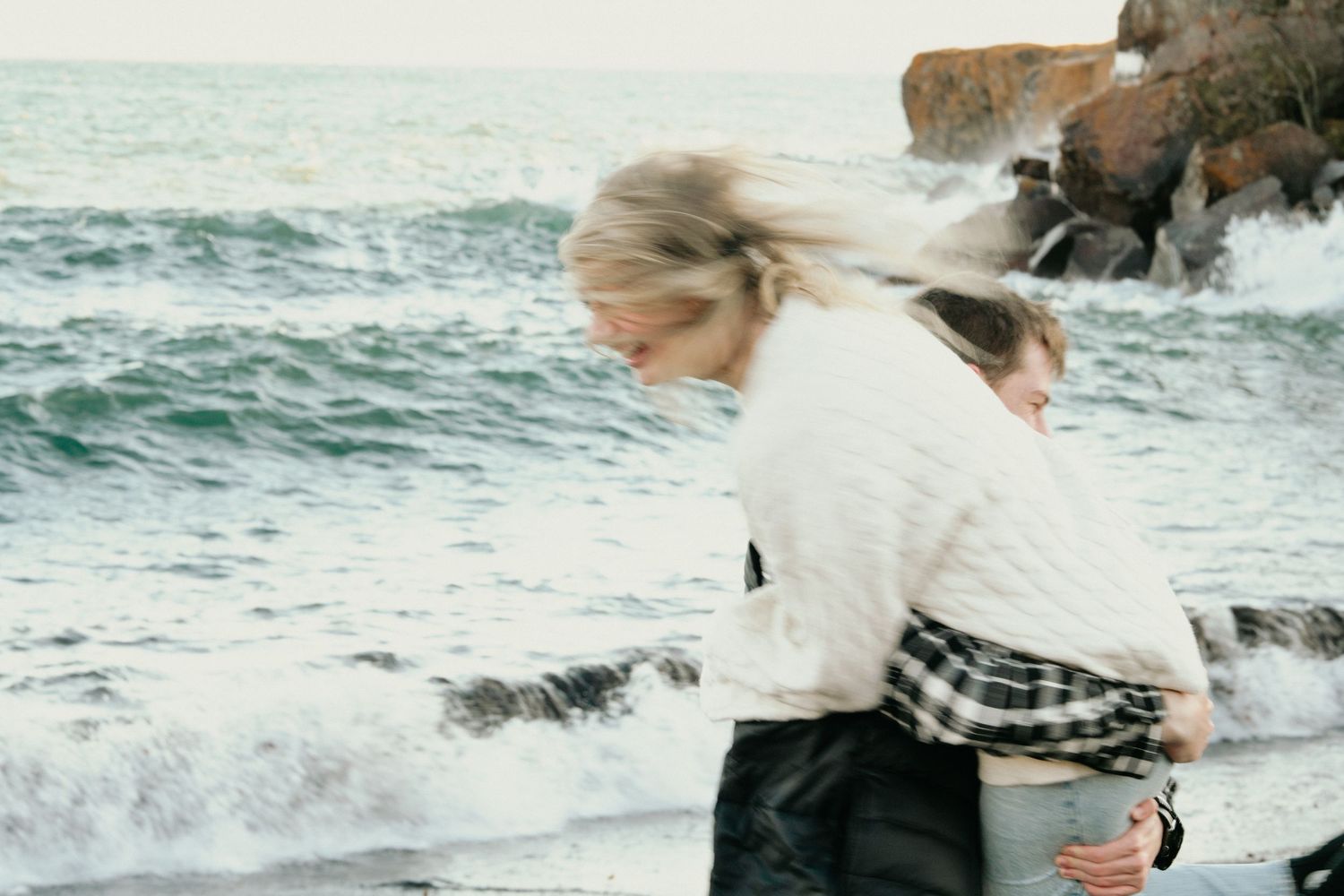 black sand beach engagement photos