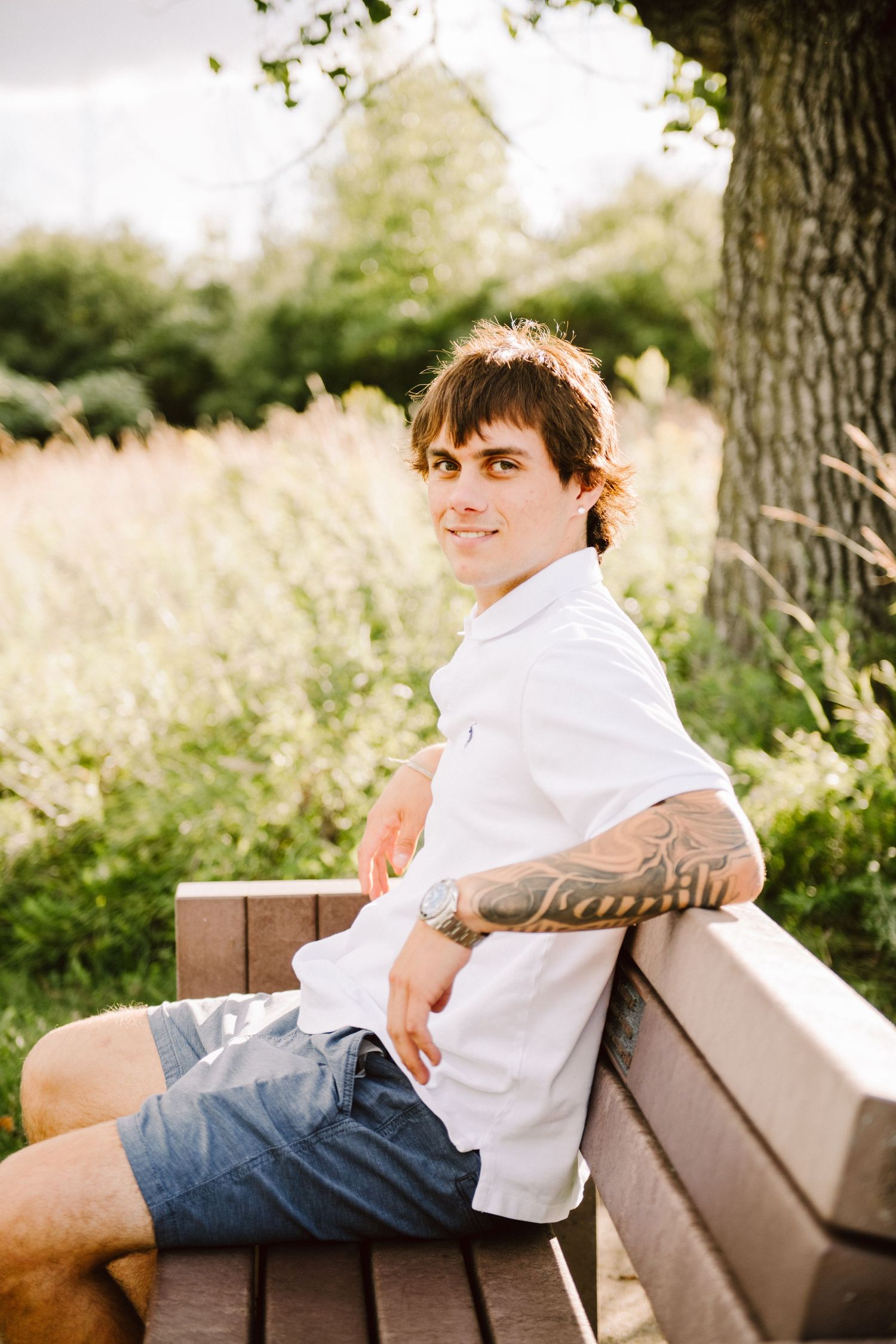 high school senior guy on bench