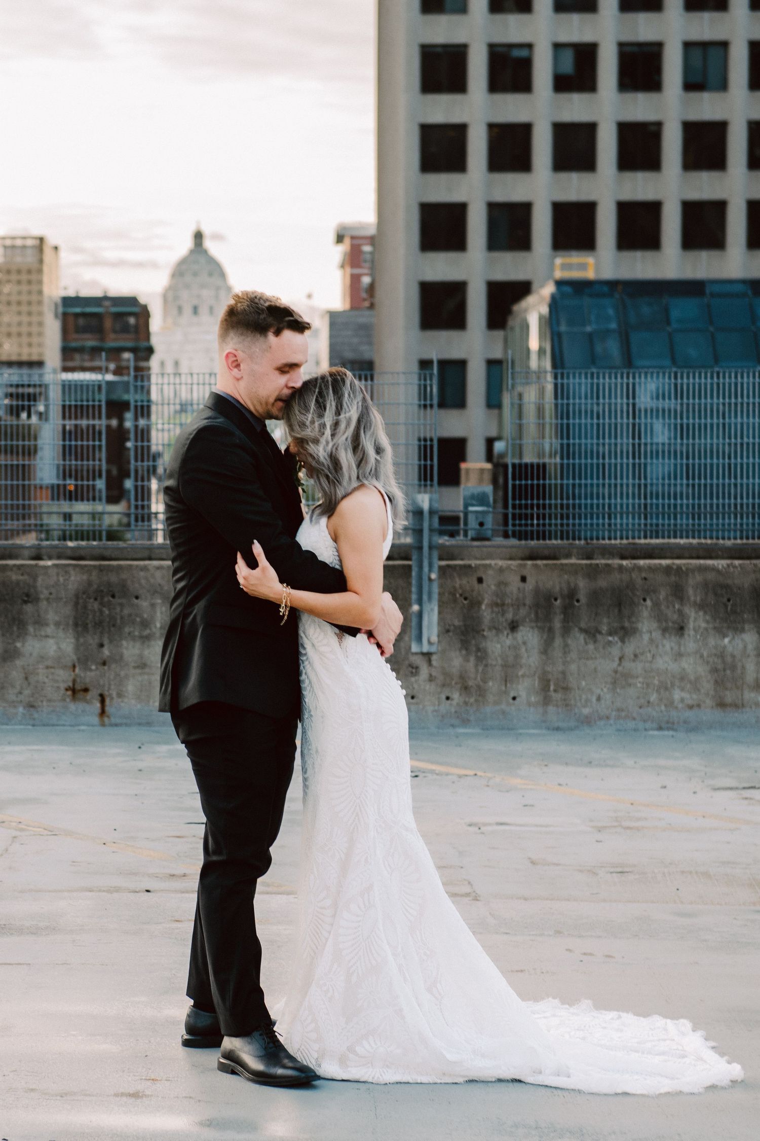 bride and groom portrait on st. paul rooftop