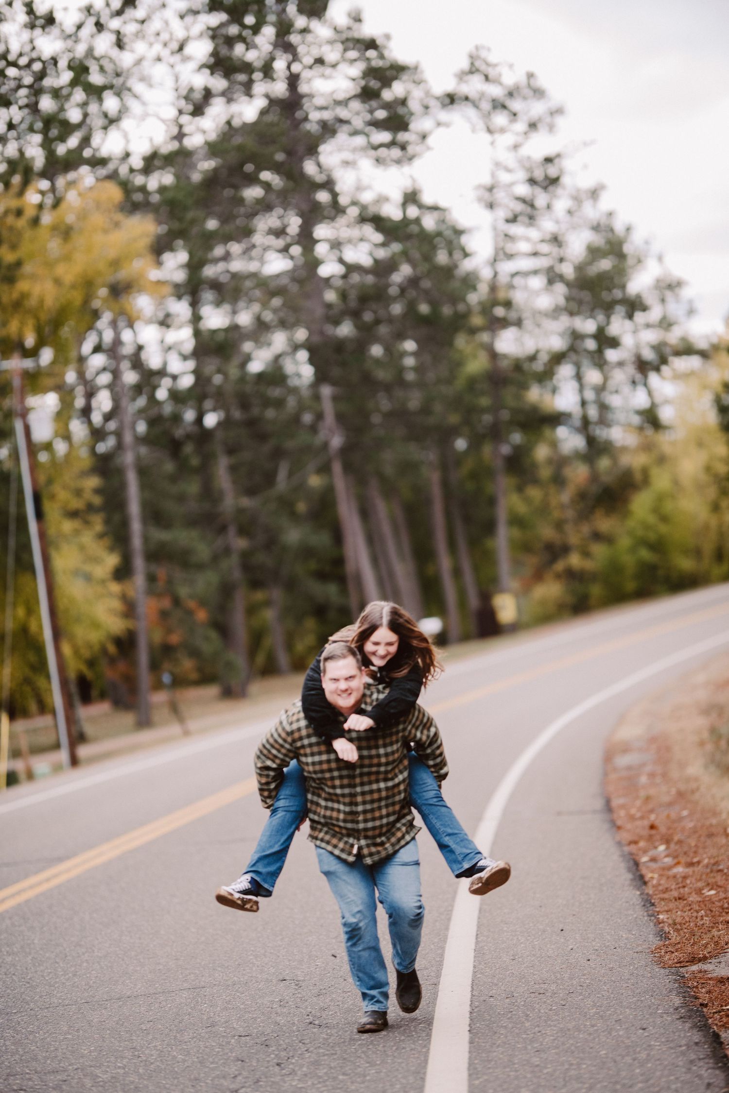 man giving girlfriend piggyback ride