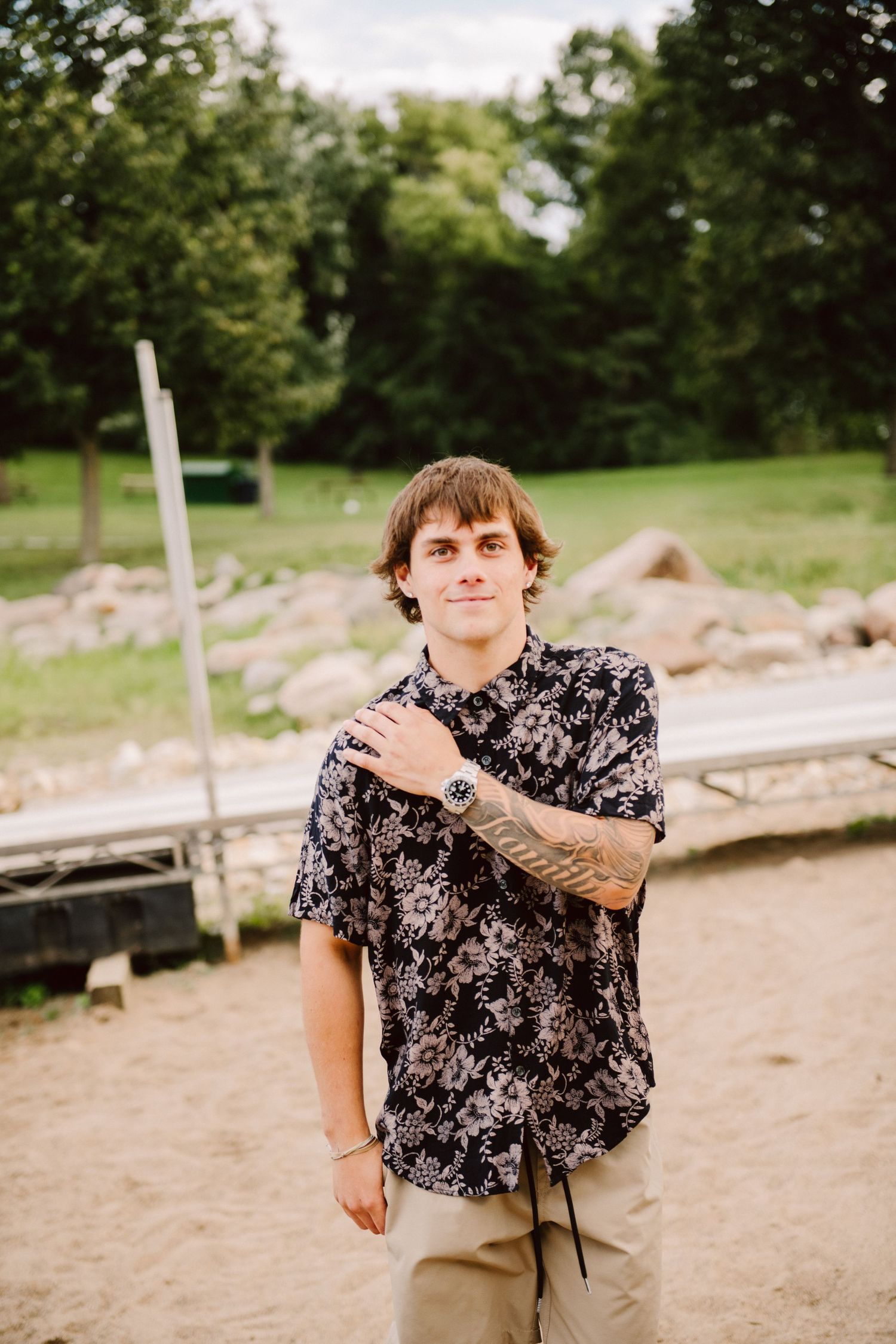 high school senior guy on beach