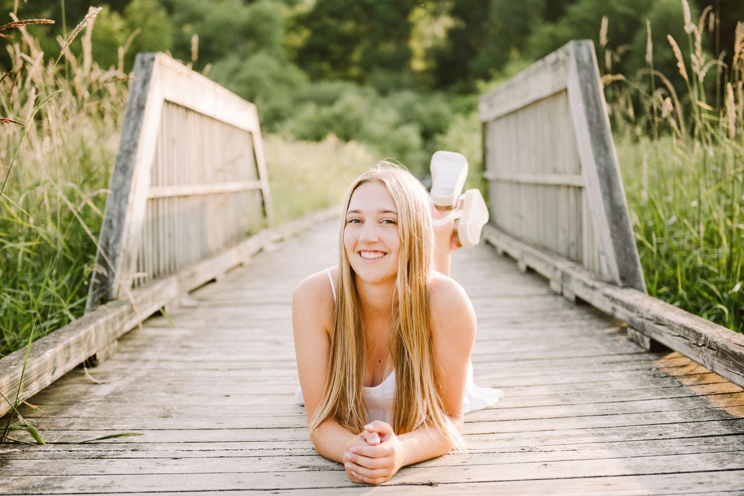 high school senior girl pictures on a walking bridge