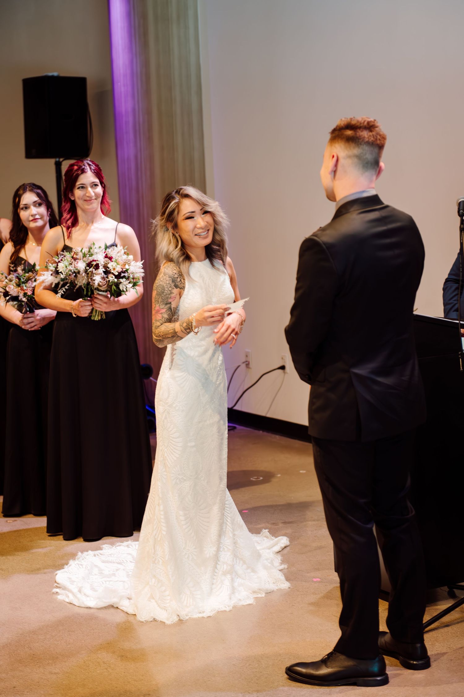 bride and groom at altar