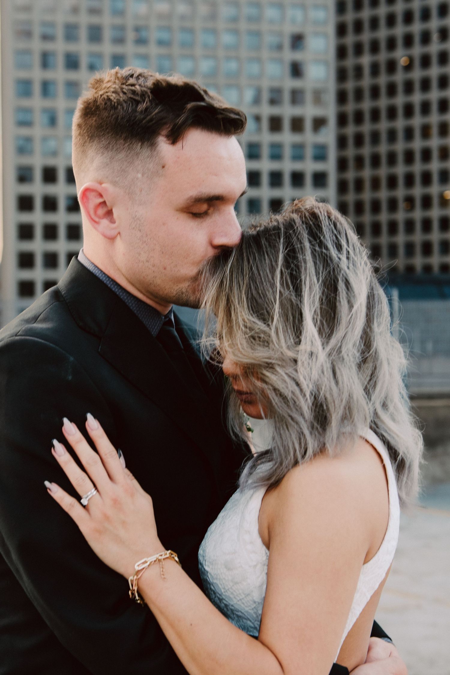 bride and groom portrait on st. paul rooftop