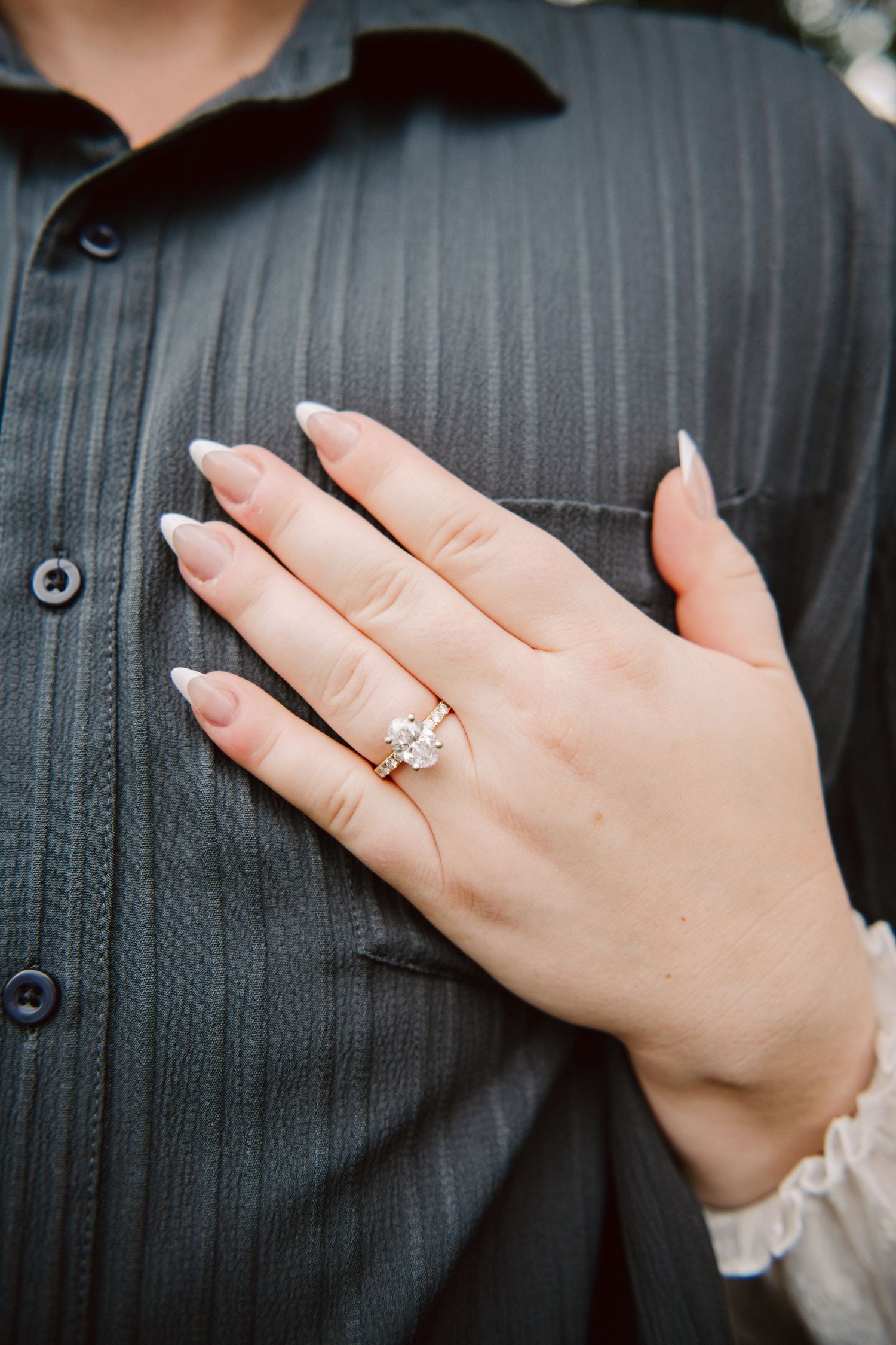 engagement ring on finger