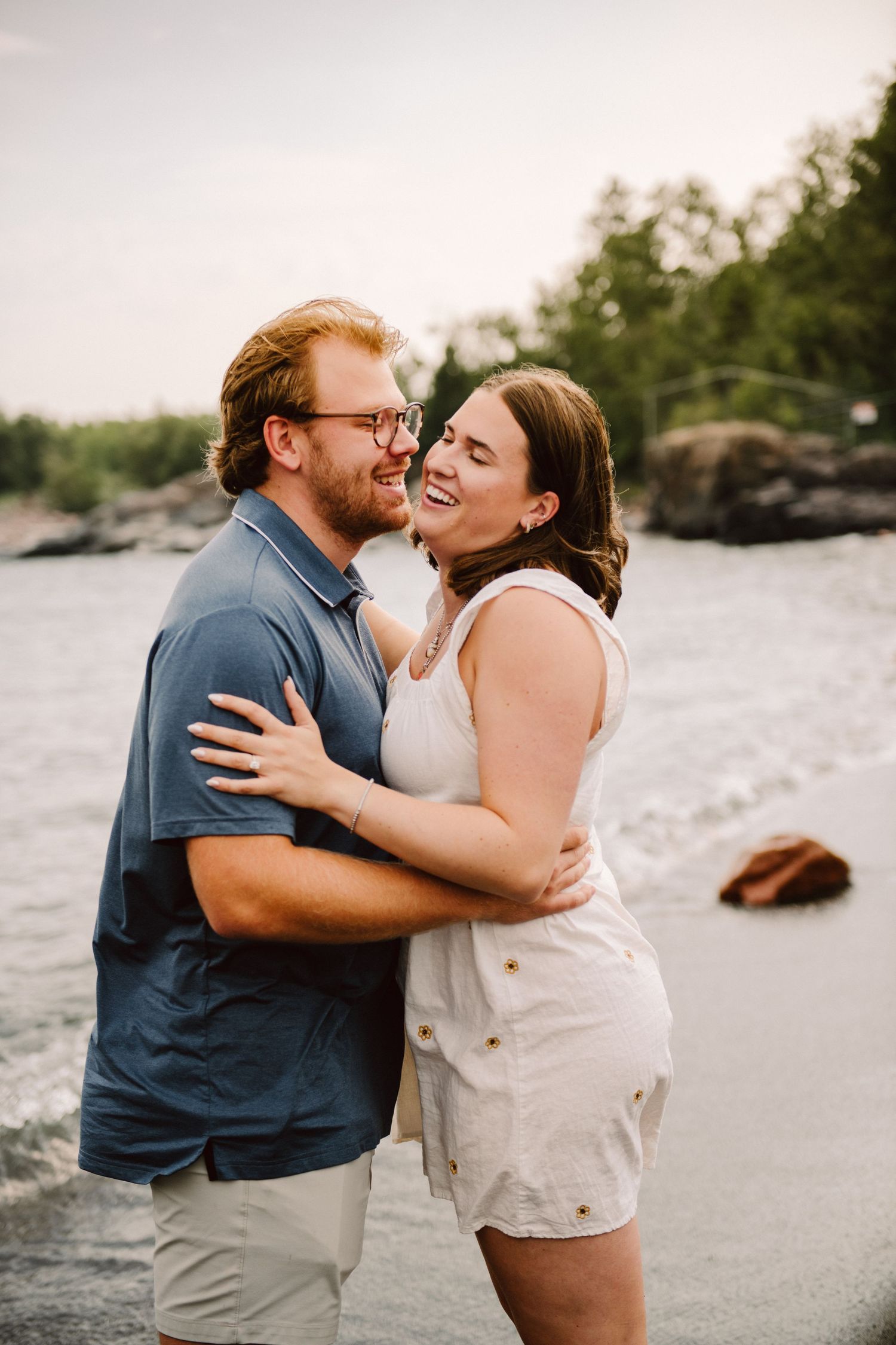 couple engagement pictures black sand beach