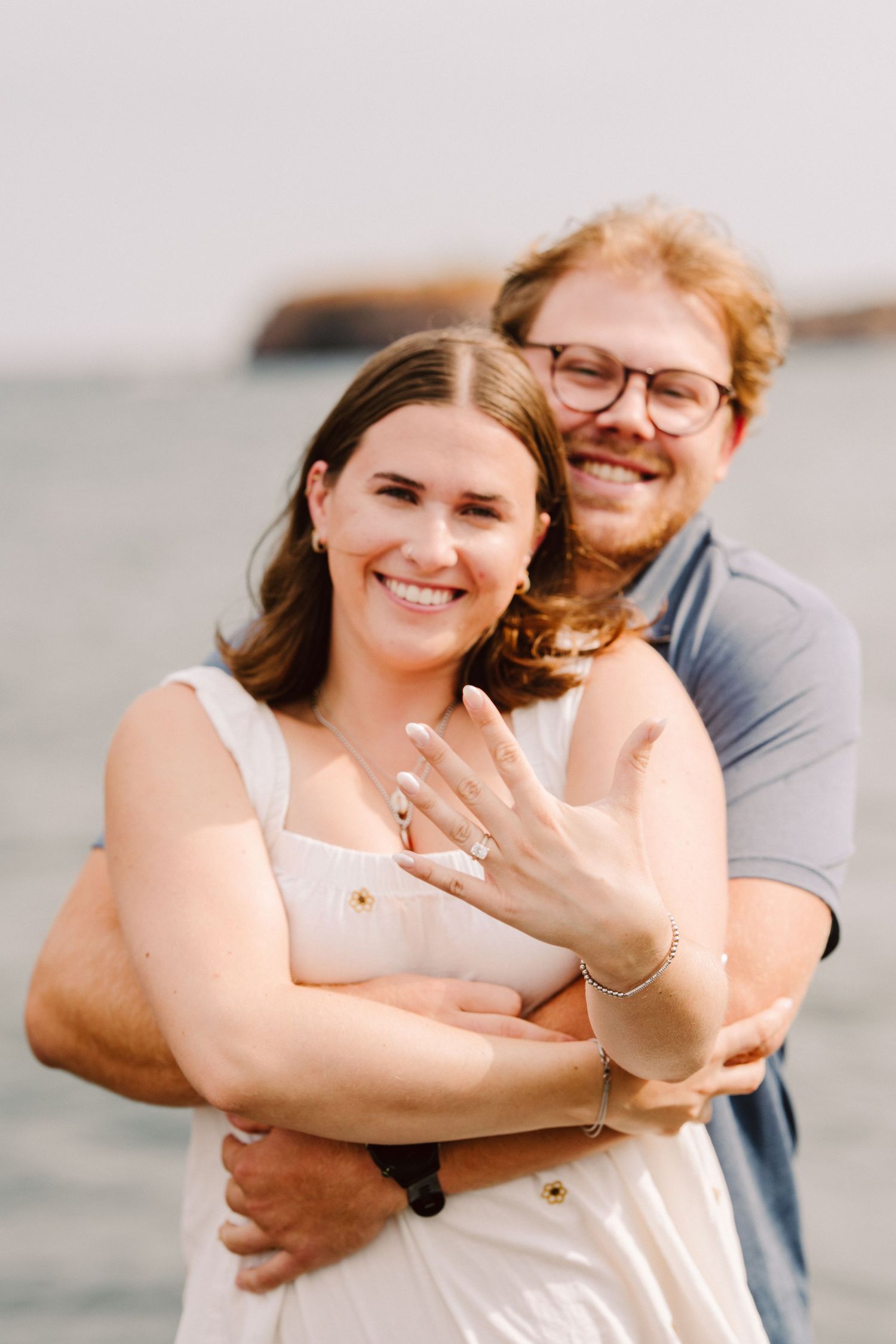 couple showing of engagement ring