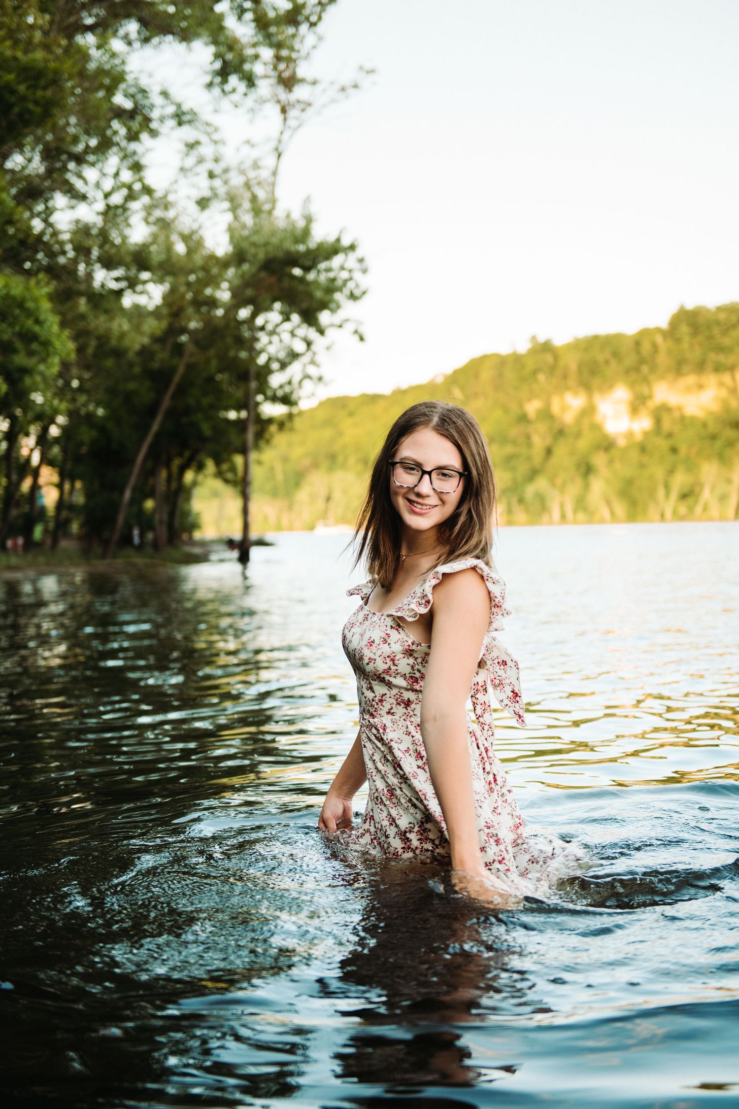 high school senior girl in river