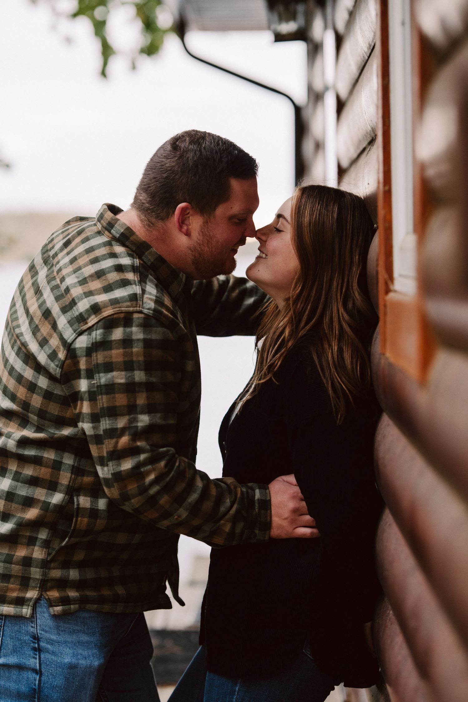 man and woman at a cabin