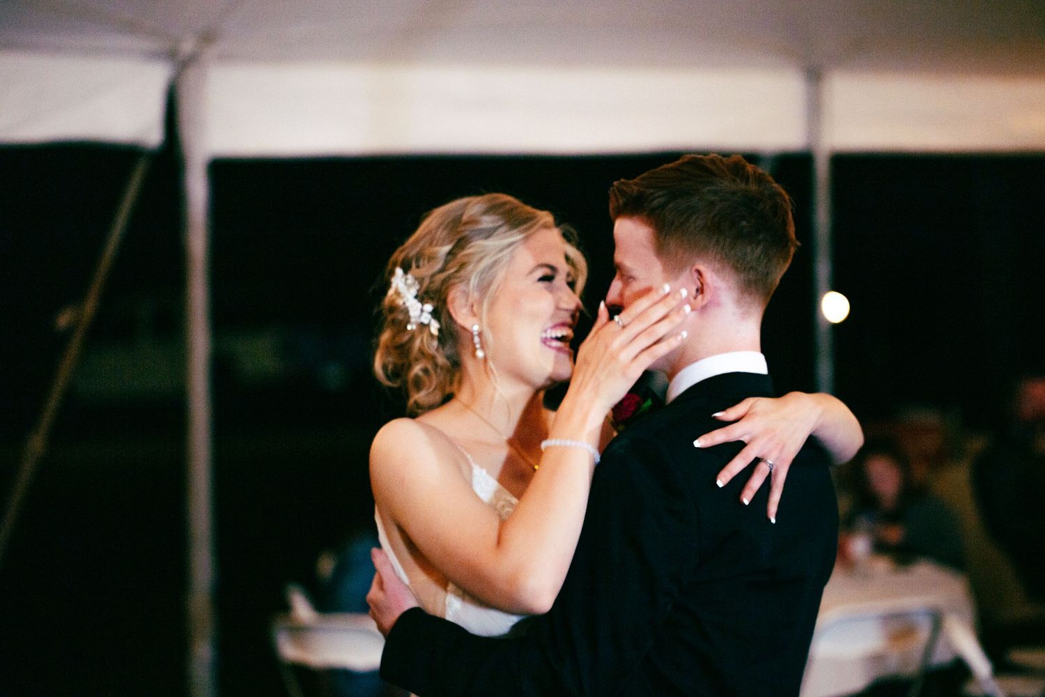 wedding first dance between bride and groom