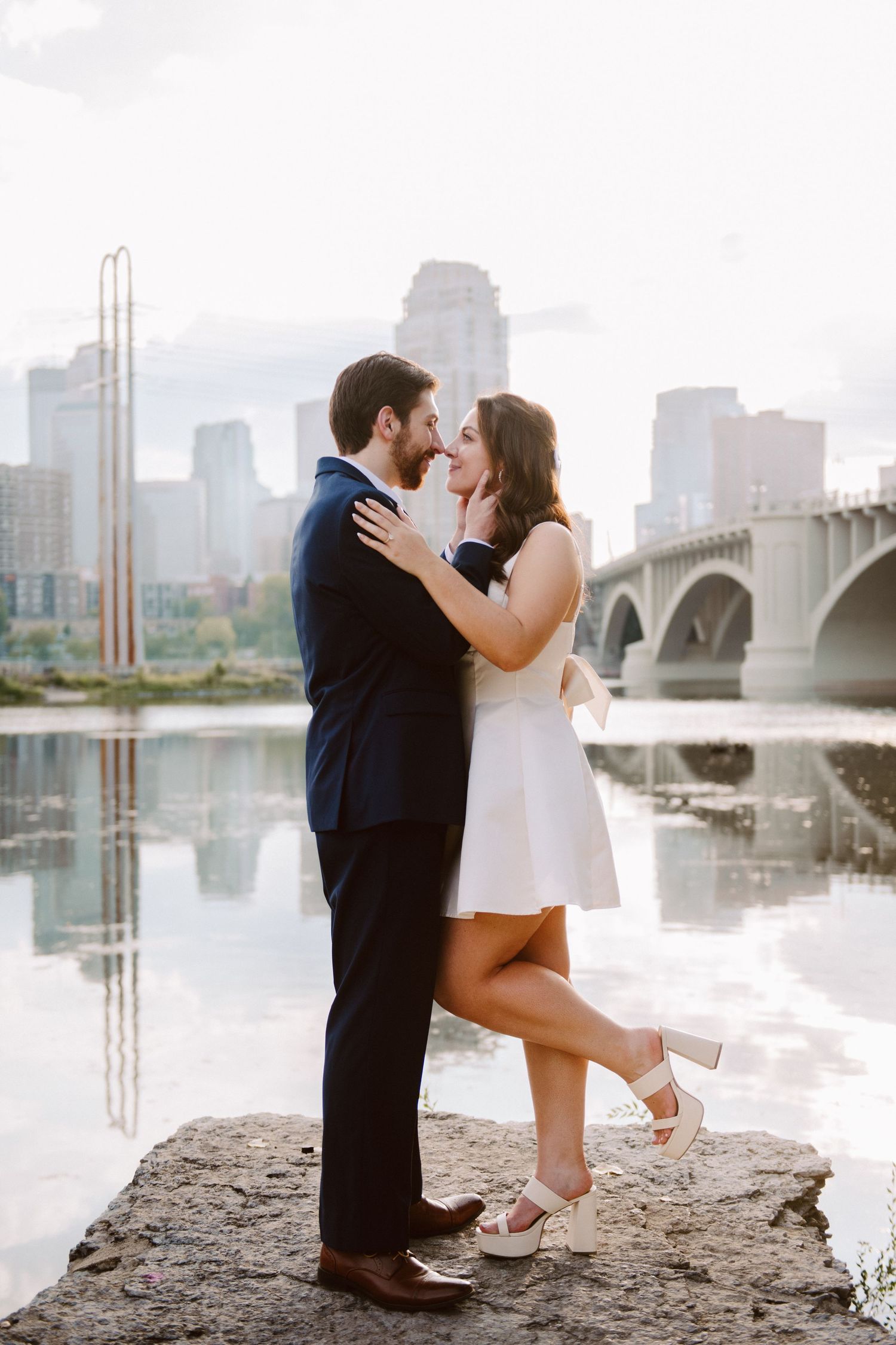 engagement pictures in minneapolis on a rock