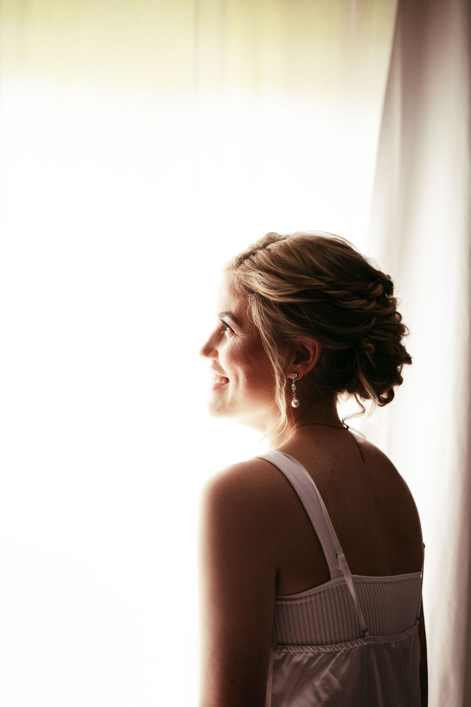bridal portrait in front of window