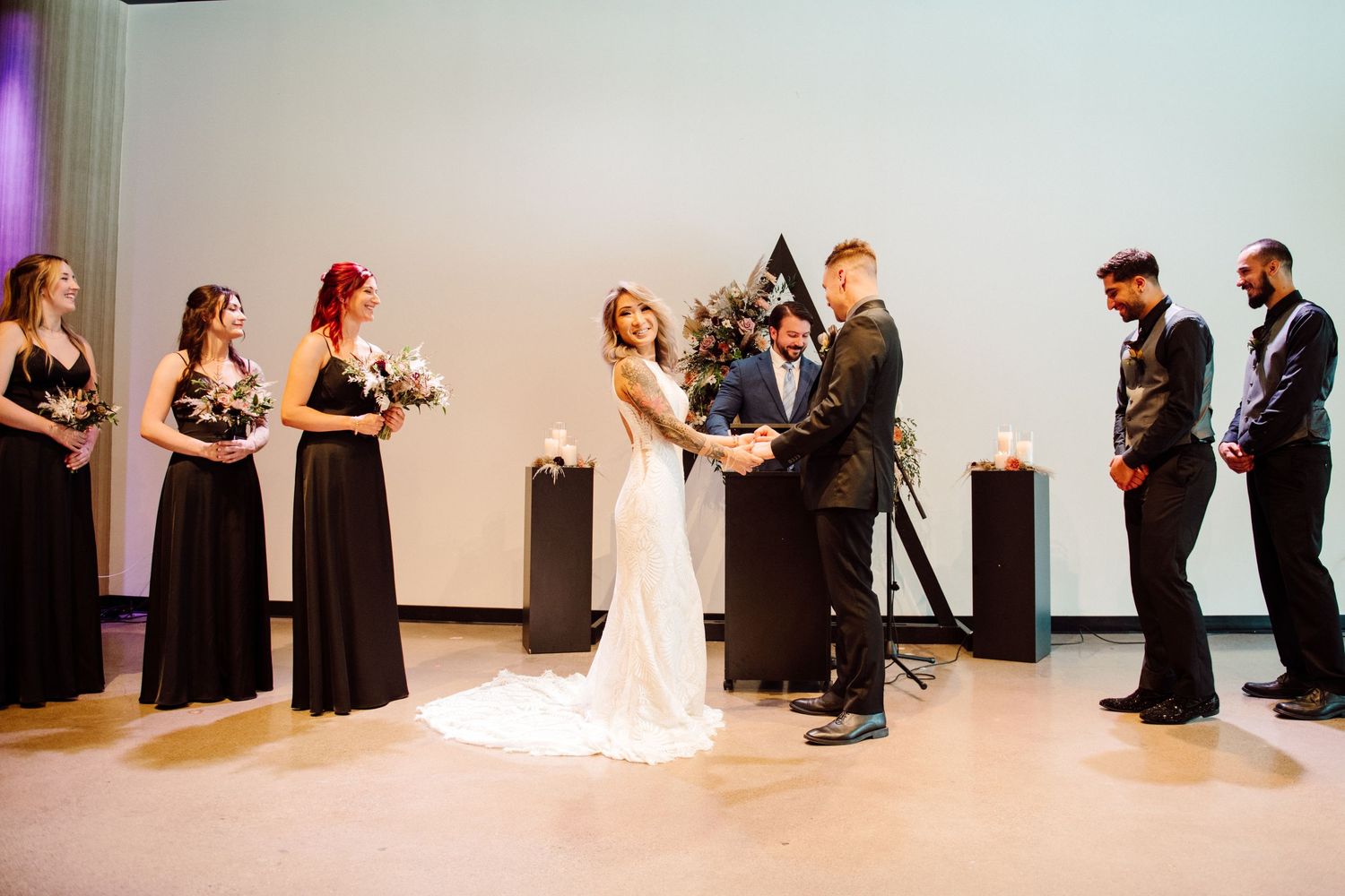 bride and groom at altar