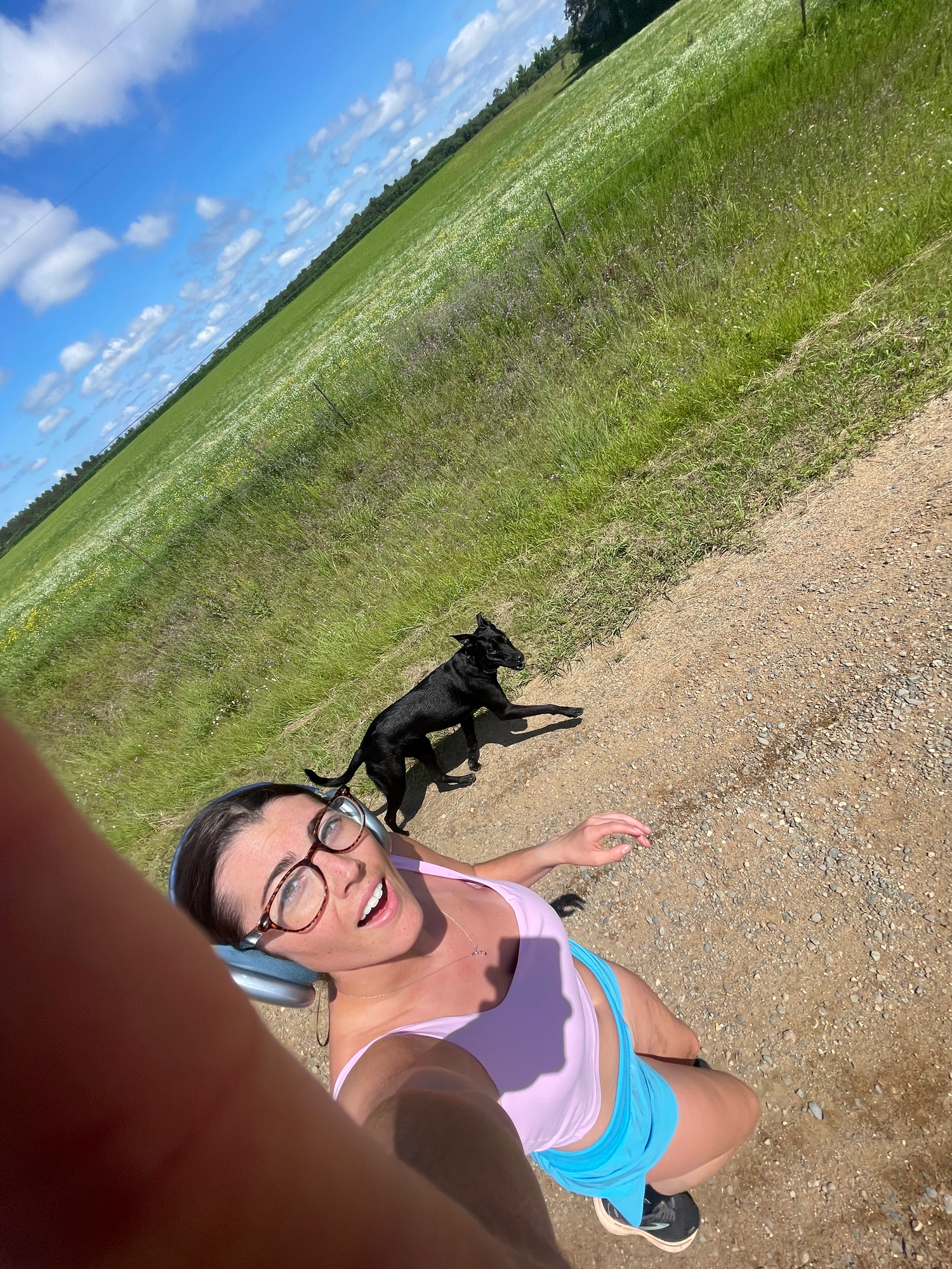 girl running with dog