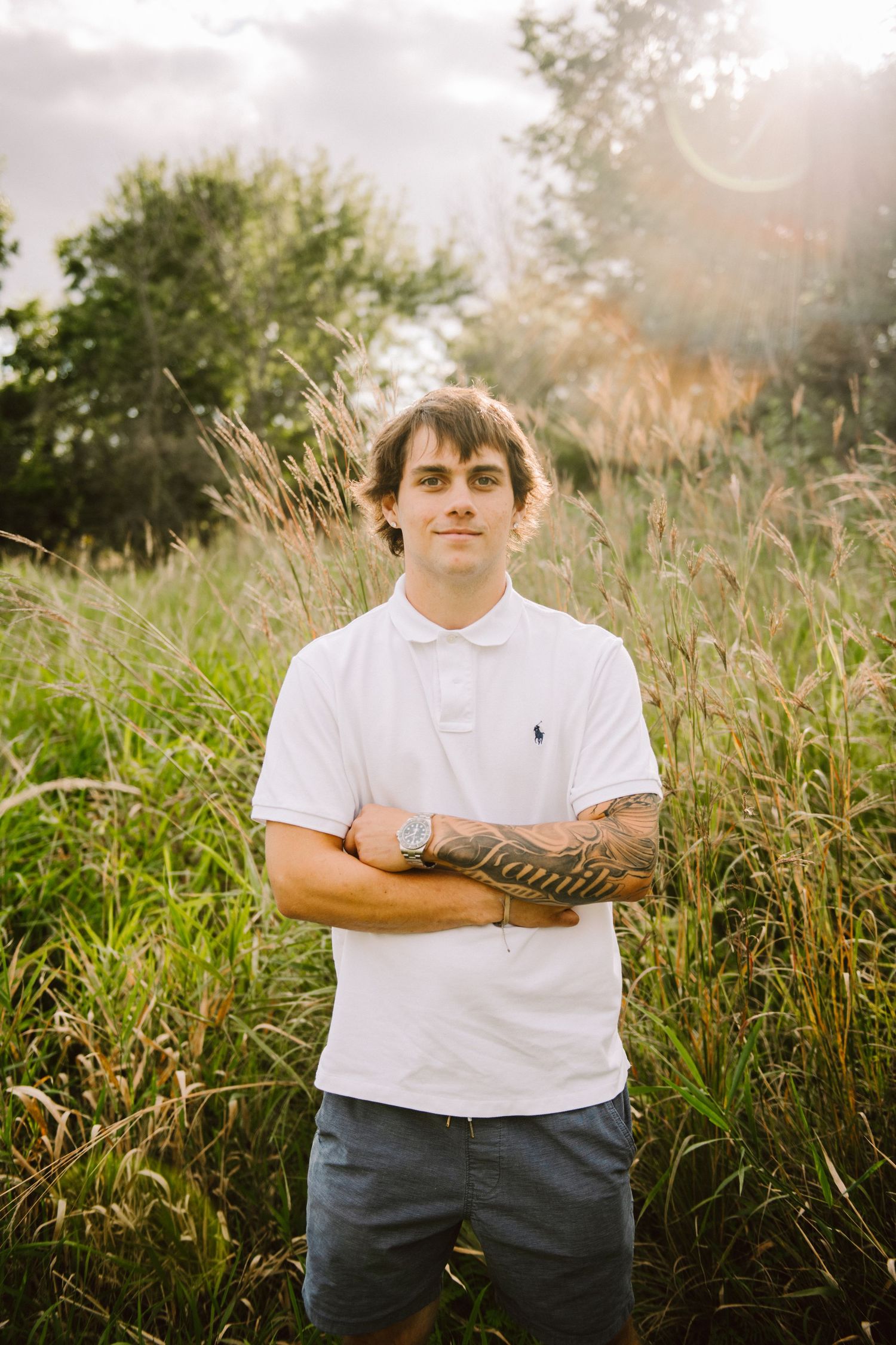 high school senior guy in field