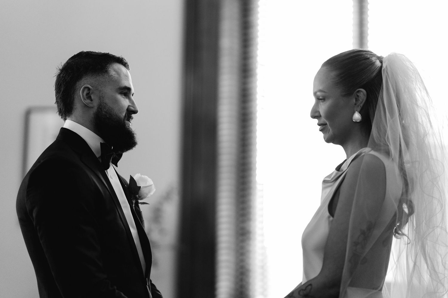 Black and white wedding photos capturing intimate moments between the couple.