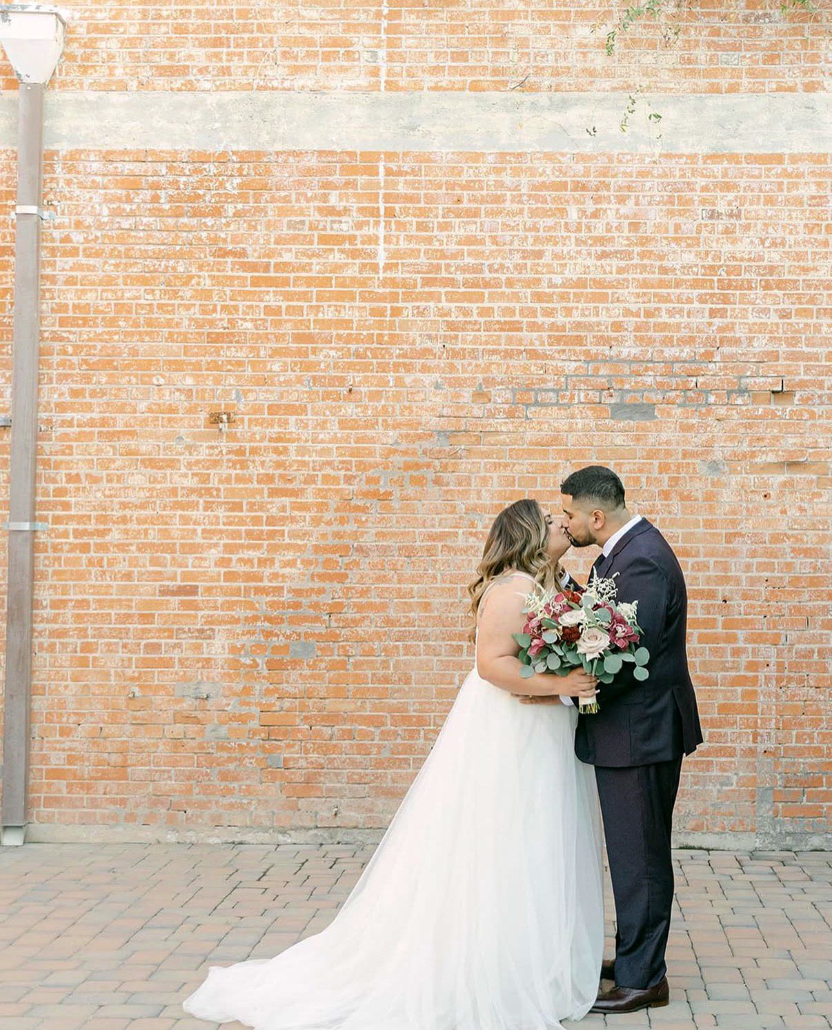 Couple portraits in front of the altar or venue