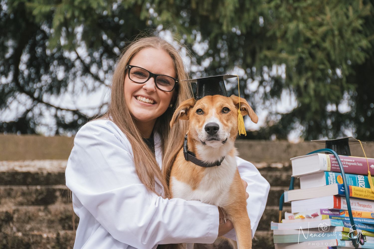 nursing senior photo of graduate with her dog