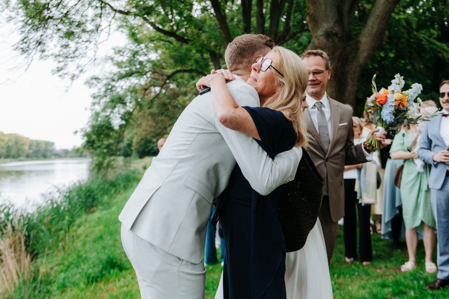 Wedding ceremony moments captured in an outdoor garden setting.