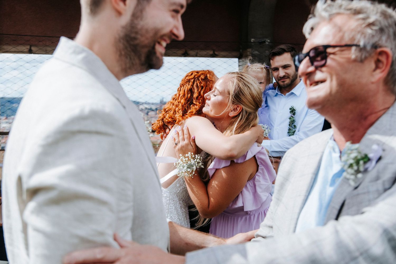 Candid reception moments showing guests enjoying conversations outdoors.