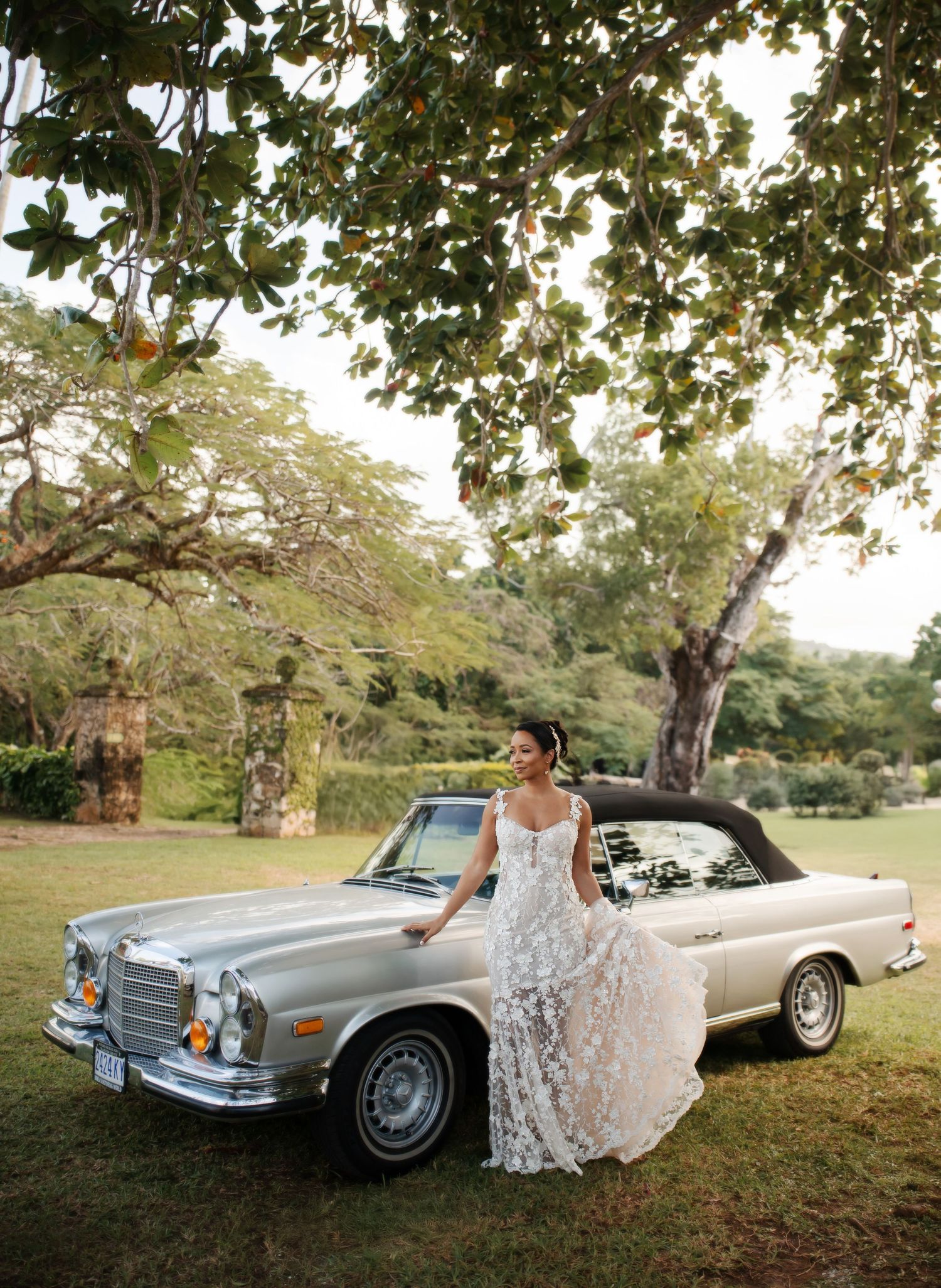 A series of romantic bridal photos featuring a classic silver Mercedes-Benz car in a sunlit outdoor garden setting.