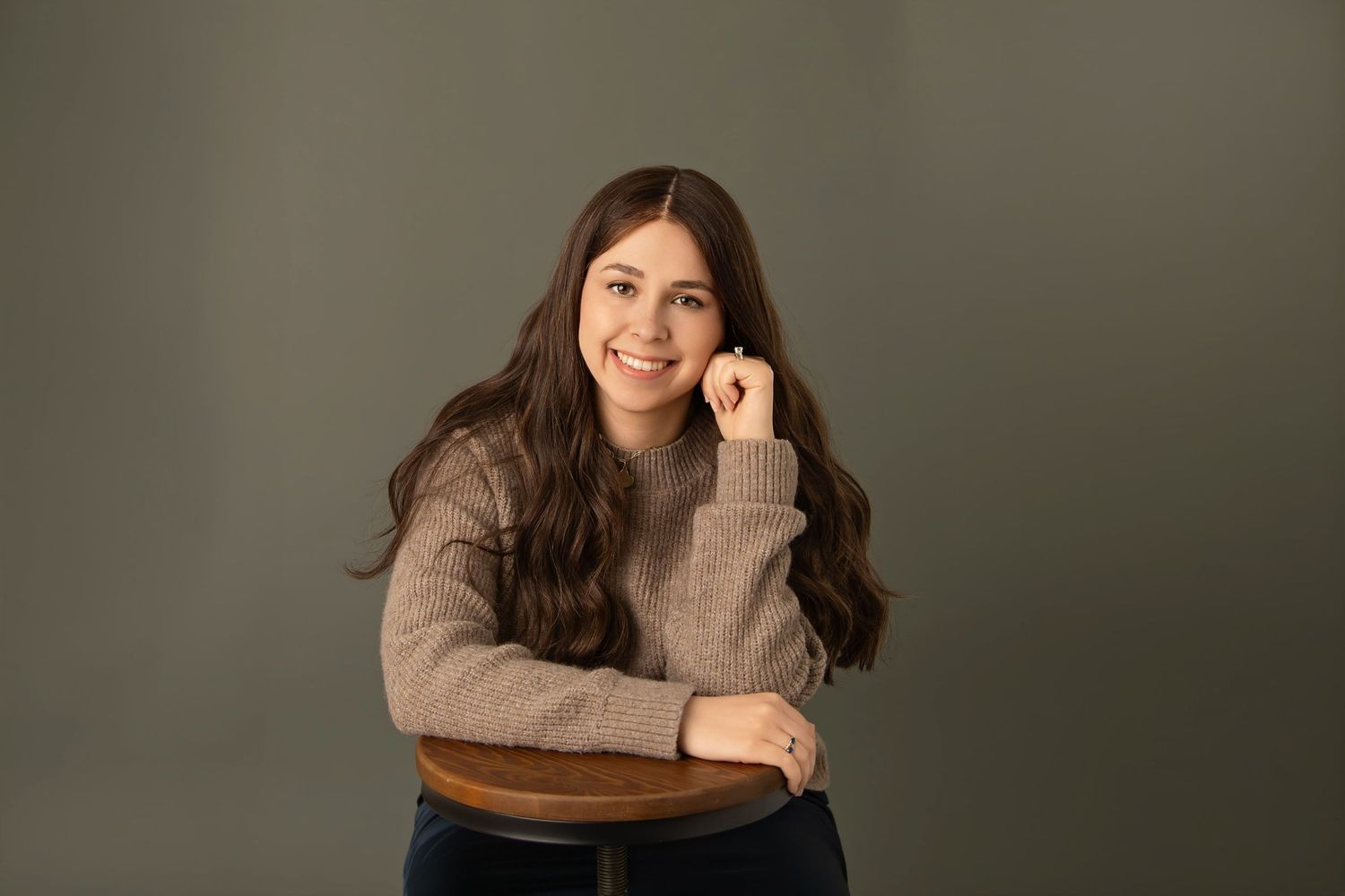 Professional branding portrait of woman in olive sweater, headshot photographer serving Toms River and Lakewood NJ