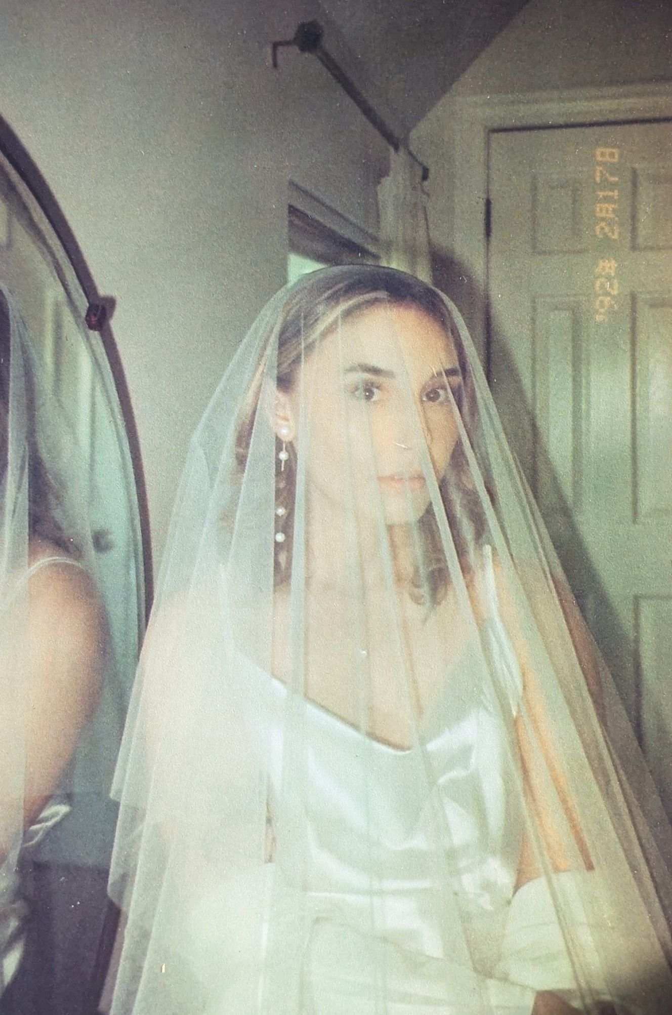 A series of vintage-style photos showing a bride wearing a traditional white veil in different poses against a light background.