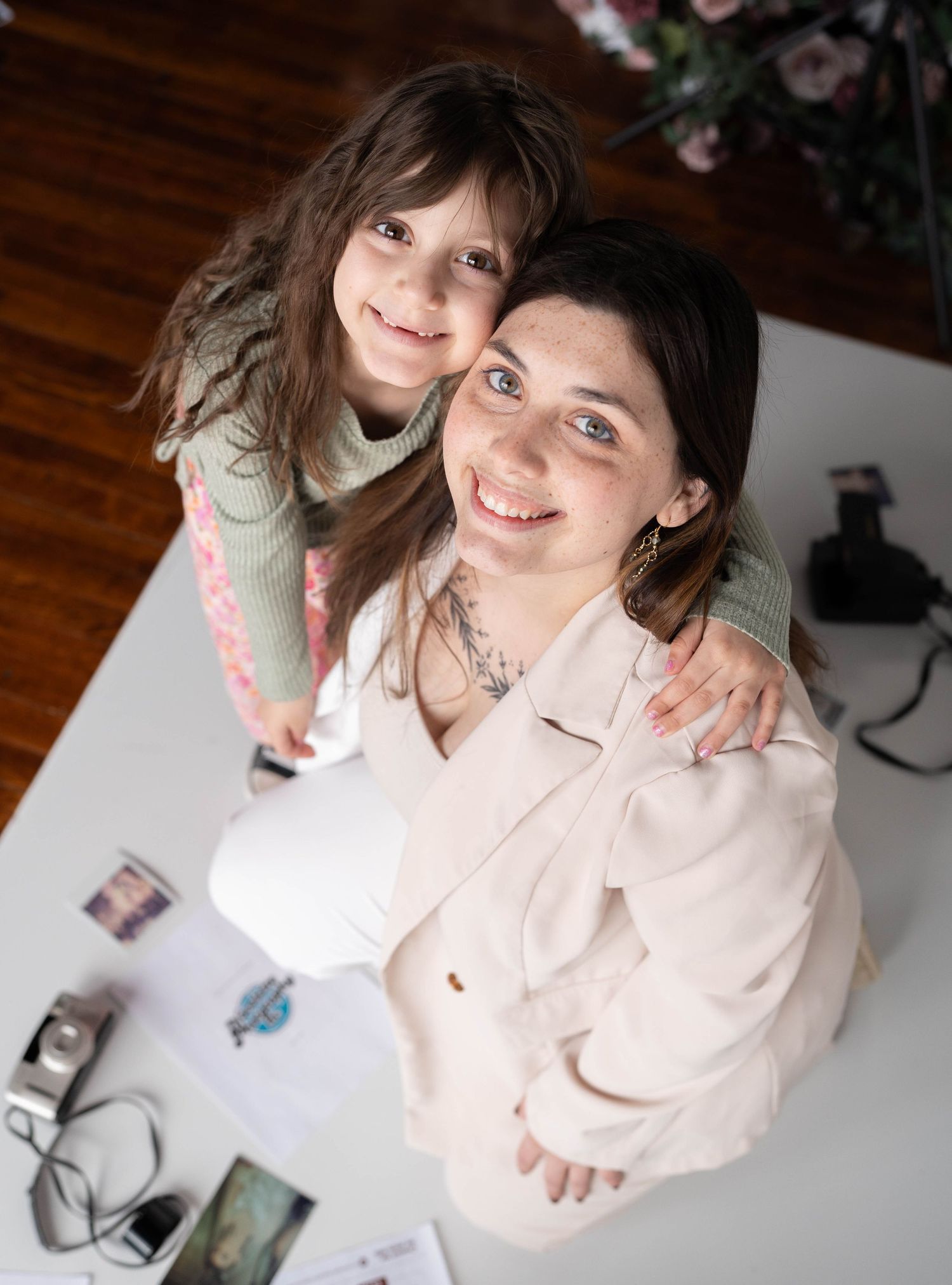 Sweet candid moments captured between parent and child in soft natural lighting.