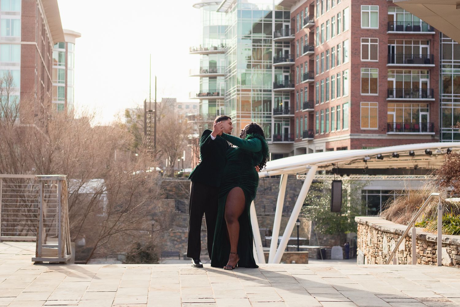 Couples in a dipped pose. Couples engagement session near in Falls Park in downtown Greenville, SC. South Carolina Photographer
