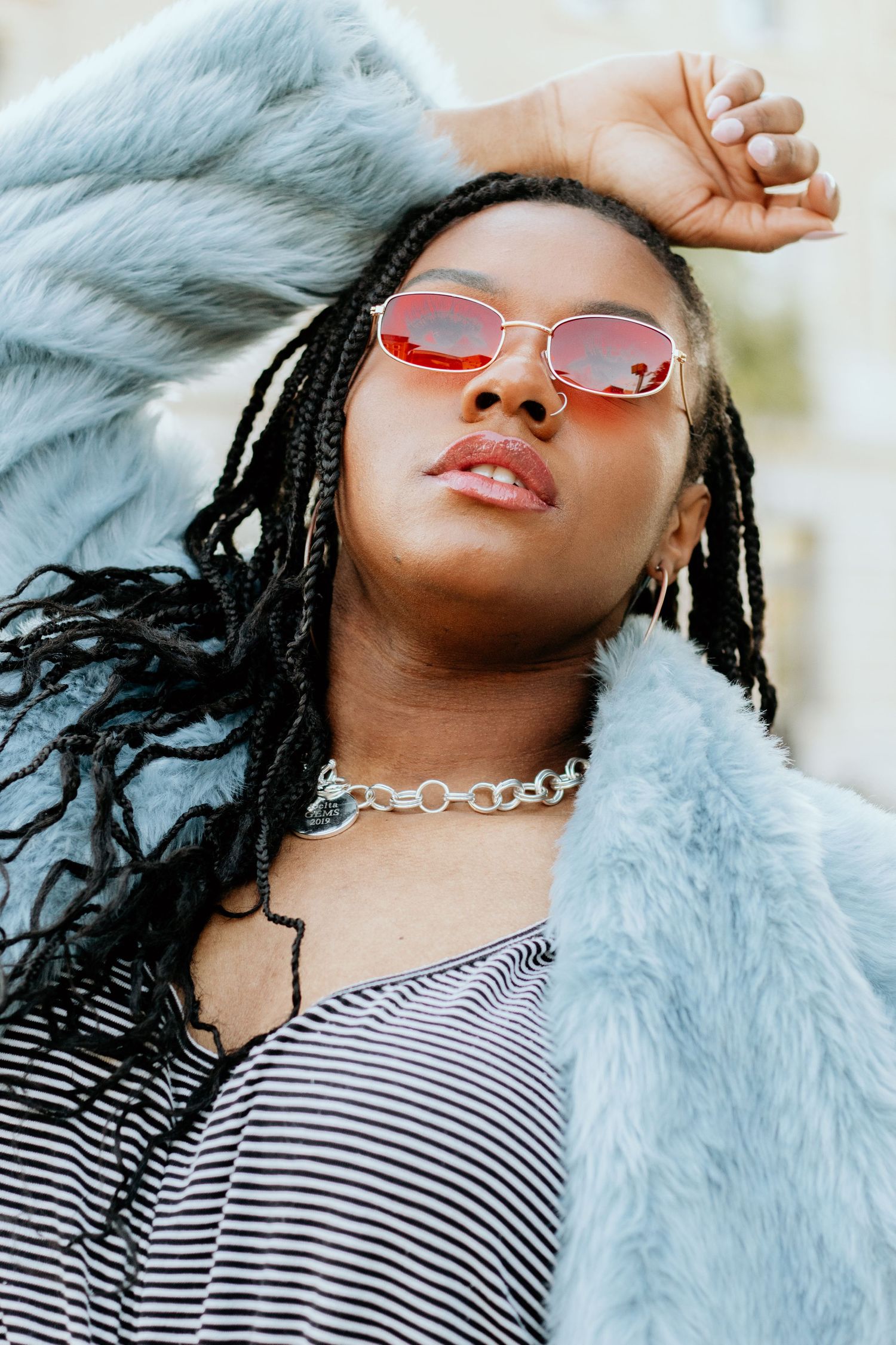 Black woman posing for South Carolina photographer in Florence, SC for editorial portraits. African american true to color candid headshots