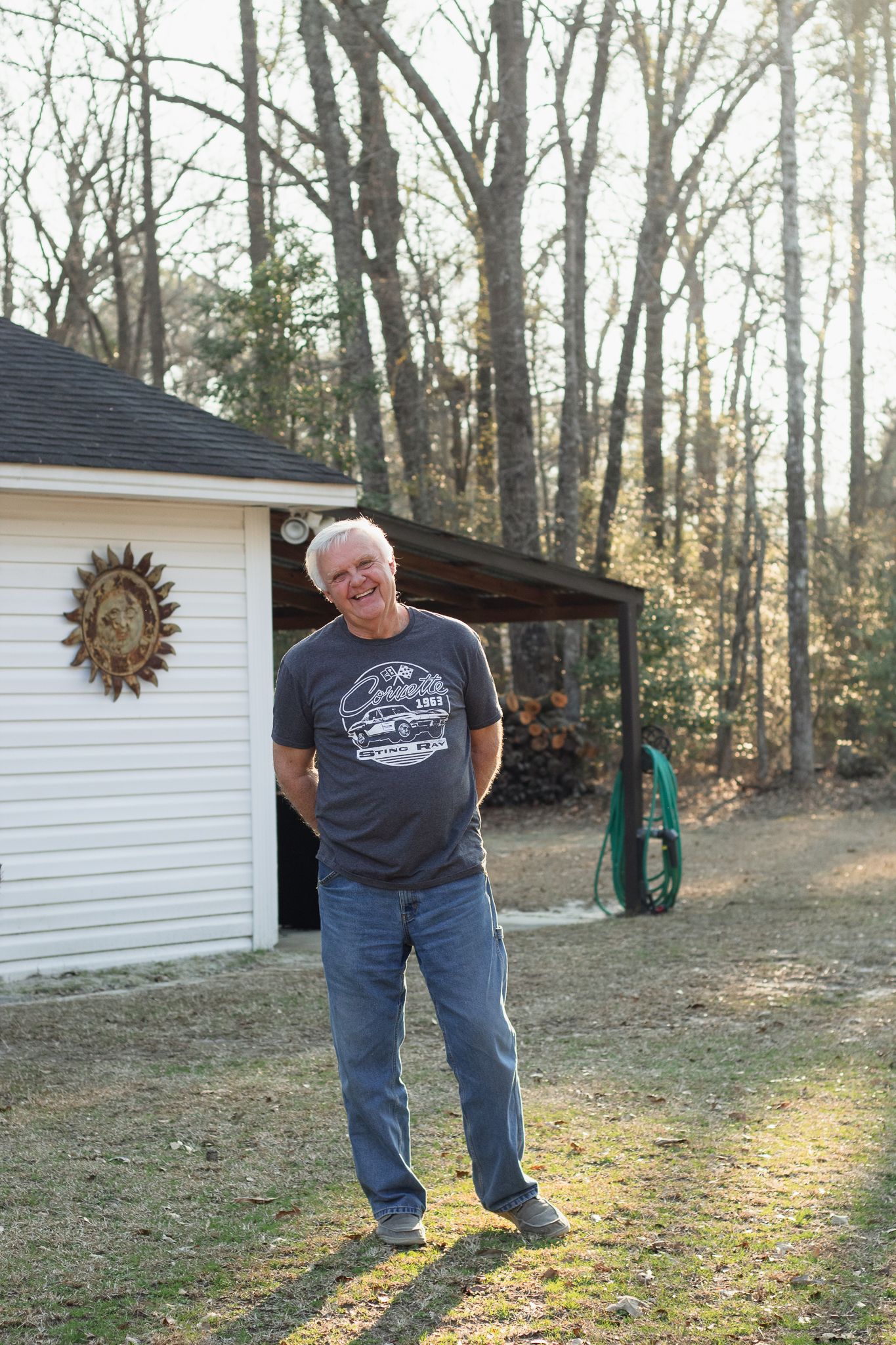 Older man stands candid for South Carolina photographer portraits in Florence, SC candid and true to color photography.