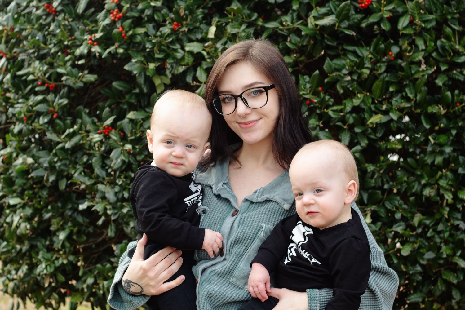 Twin babies posing for South Carolina photographer upstate SC family portraits photography pictures. True to color candid children mommy