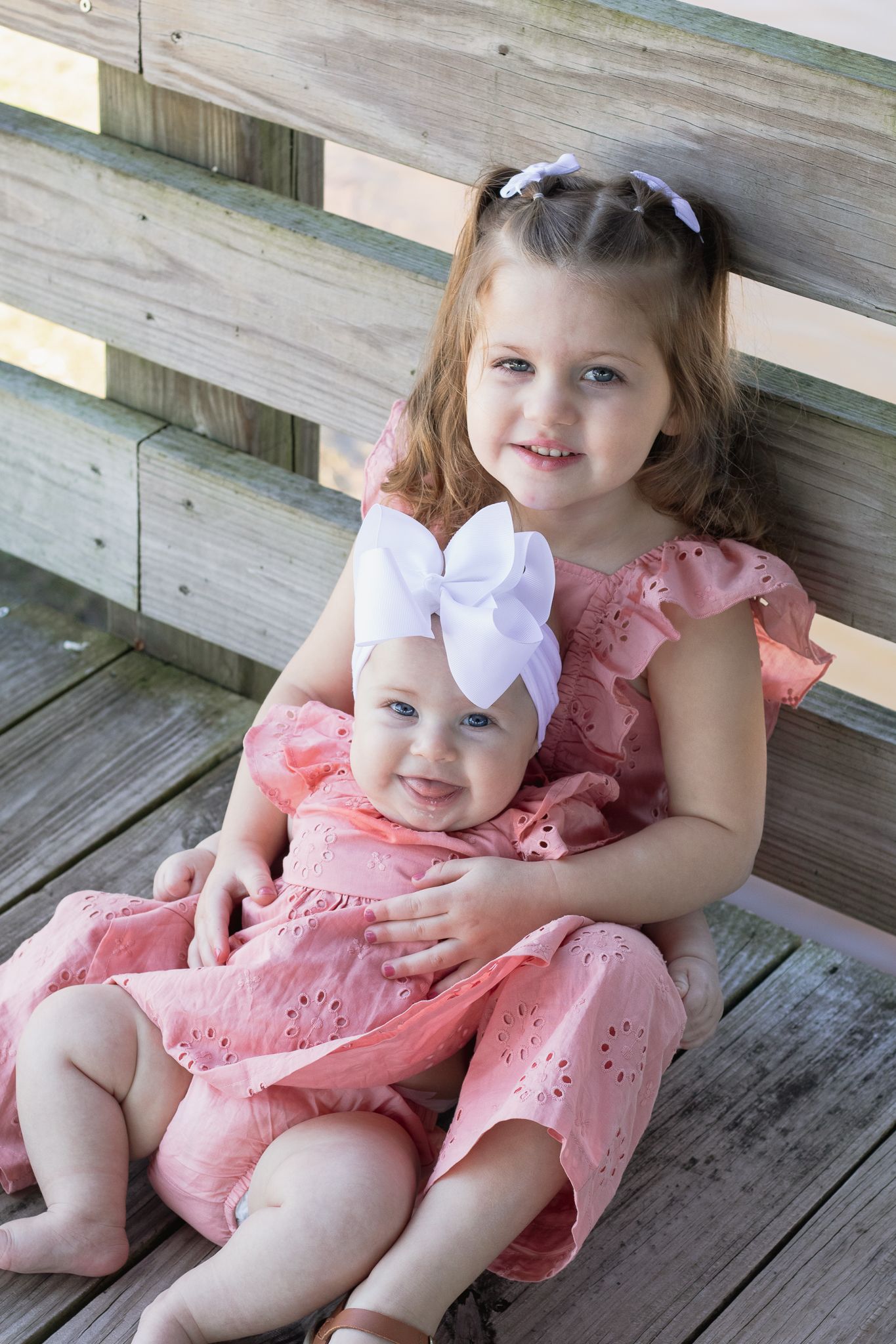 Family posing for South Carolina photographer in Lake City SC mommy portraits photoshoot. Candid true to color family pictures children