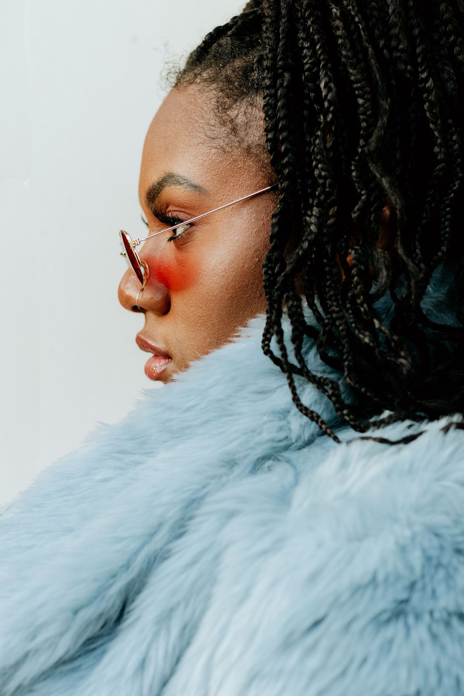 Black woman posing for South Carolina photographer in Florence, SC for editorial portraits. African american true to color candid headshots