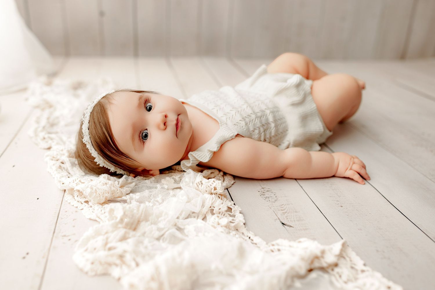 Baby girl in cream outfit Indianapolis milestone session