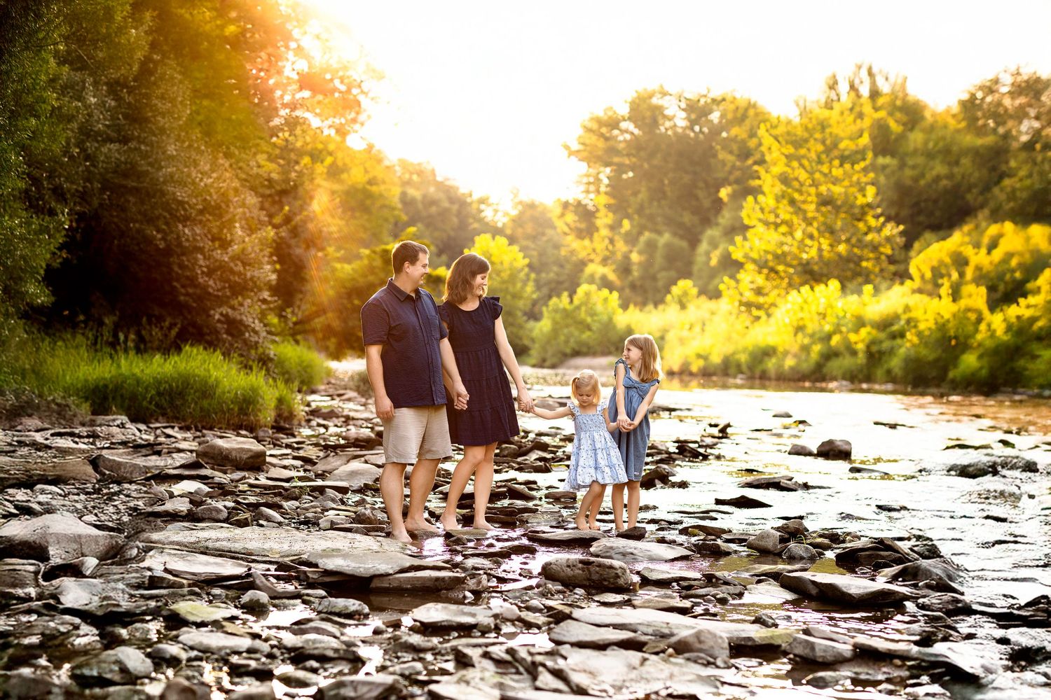 Sunset family photo session at creek in Central Indiana