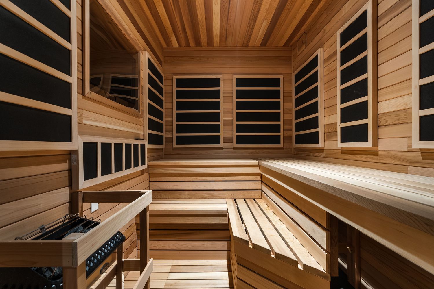 Indoor basement sauna, photographed as part of a luxury architecture and design property.