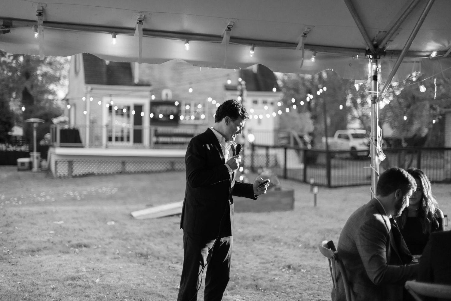 Father of bride giving speech at wedding reception