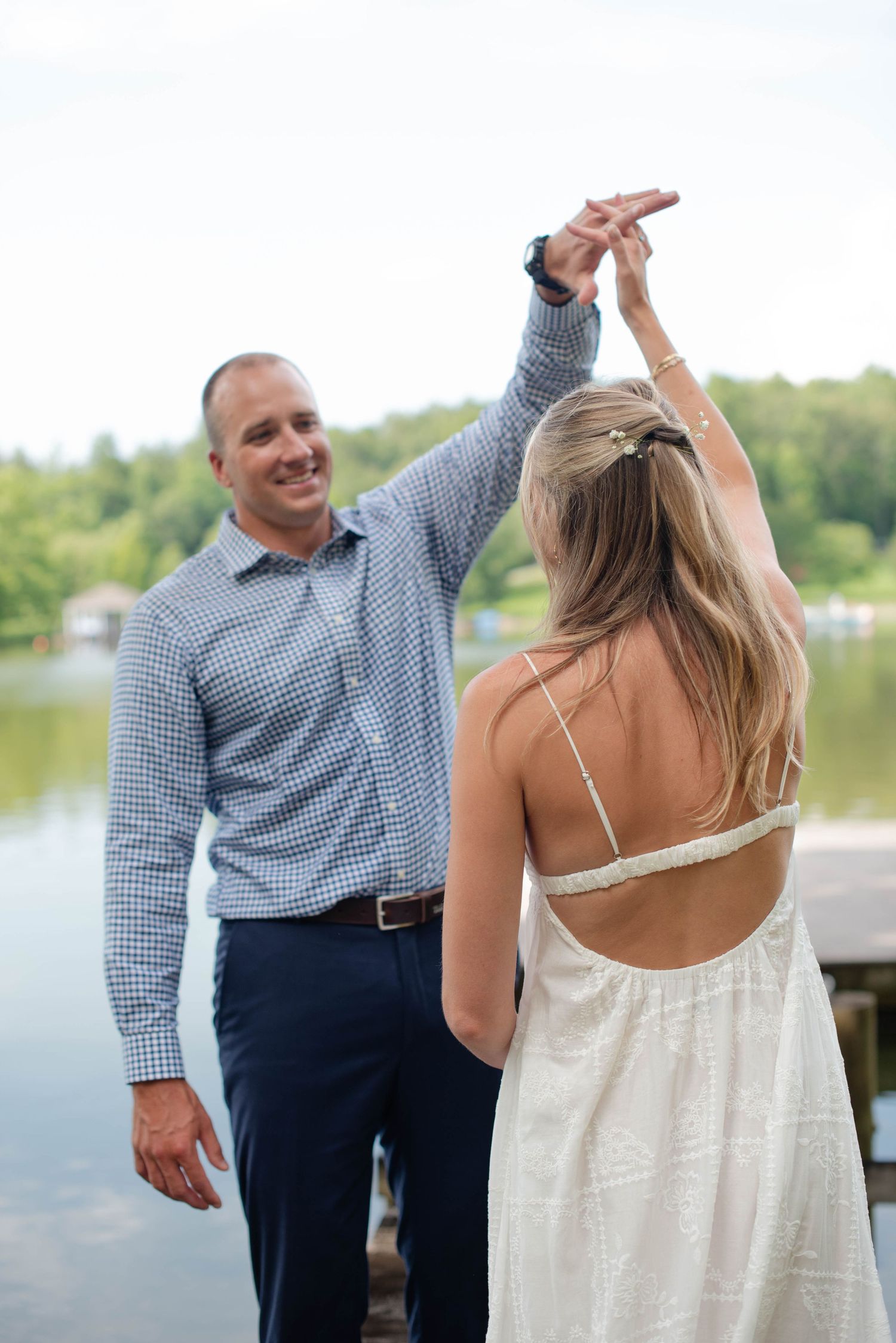 groom spinning his bride