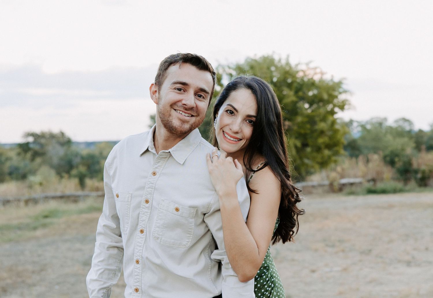 San Antonio Couple Photography. A joyful outdoor portrait session in a natural setting during golden hour.