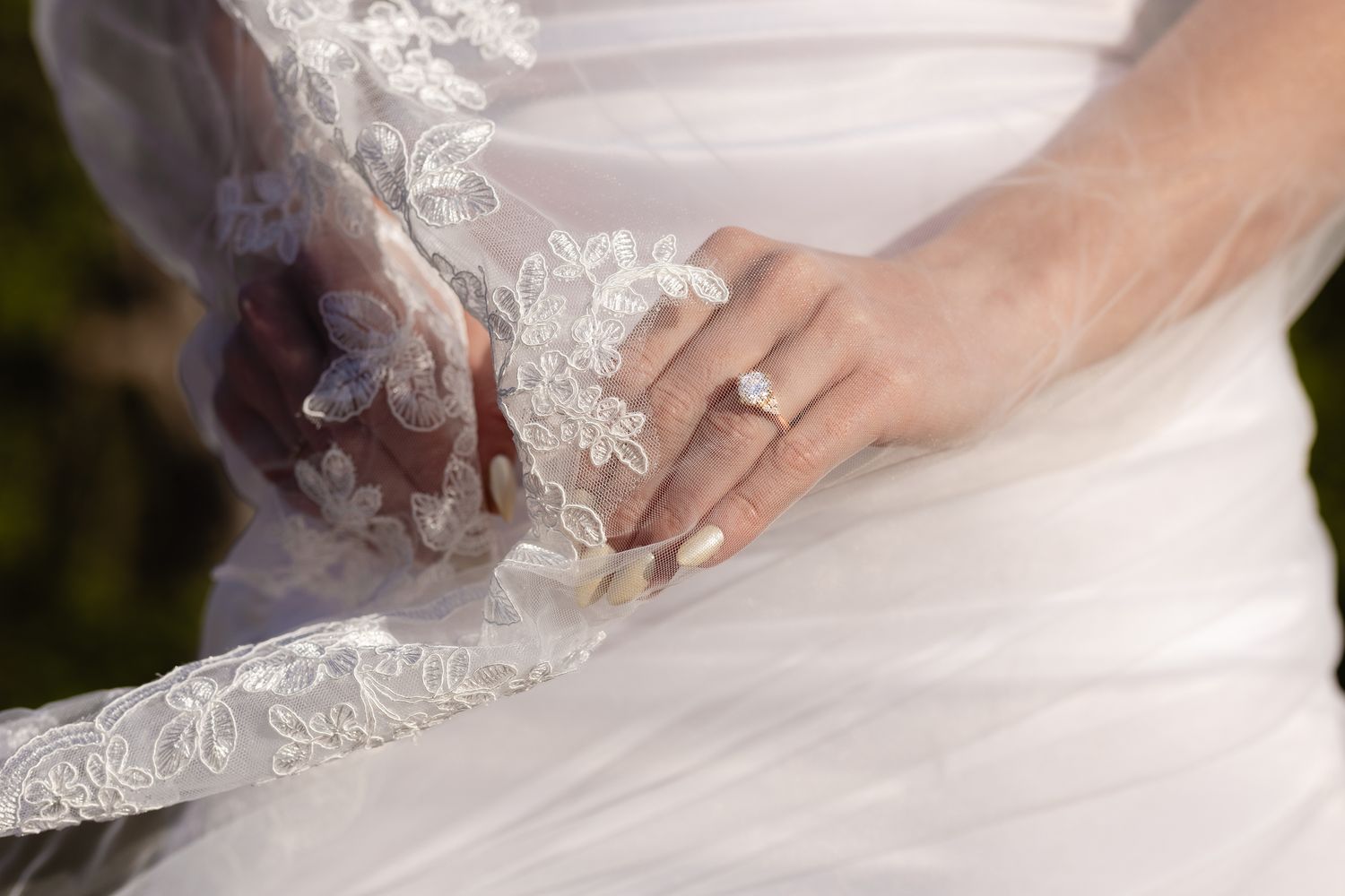 A detail shot of a bride's ring through her veil during a bridal shoot in the Columbia River Gorge.