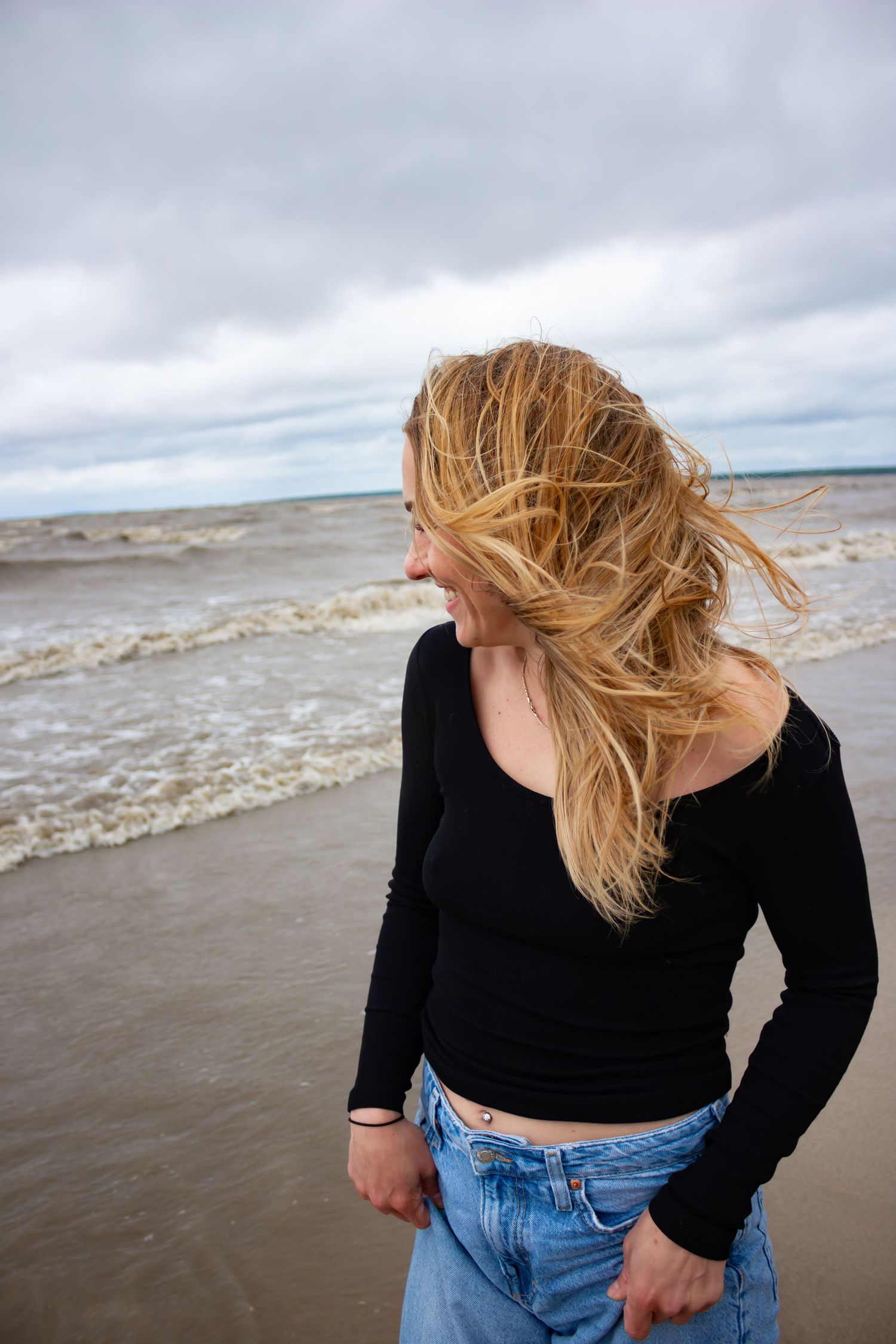 Young woman posing at the beach