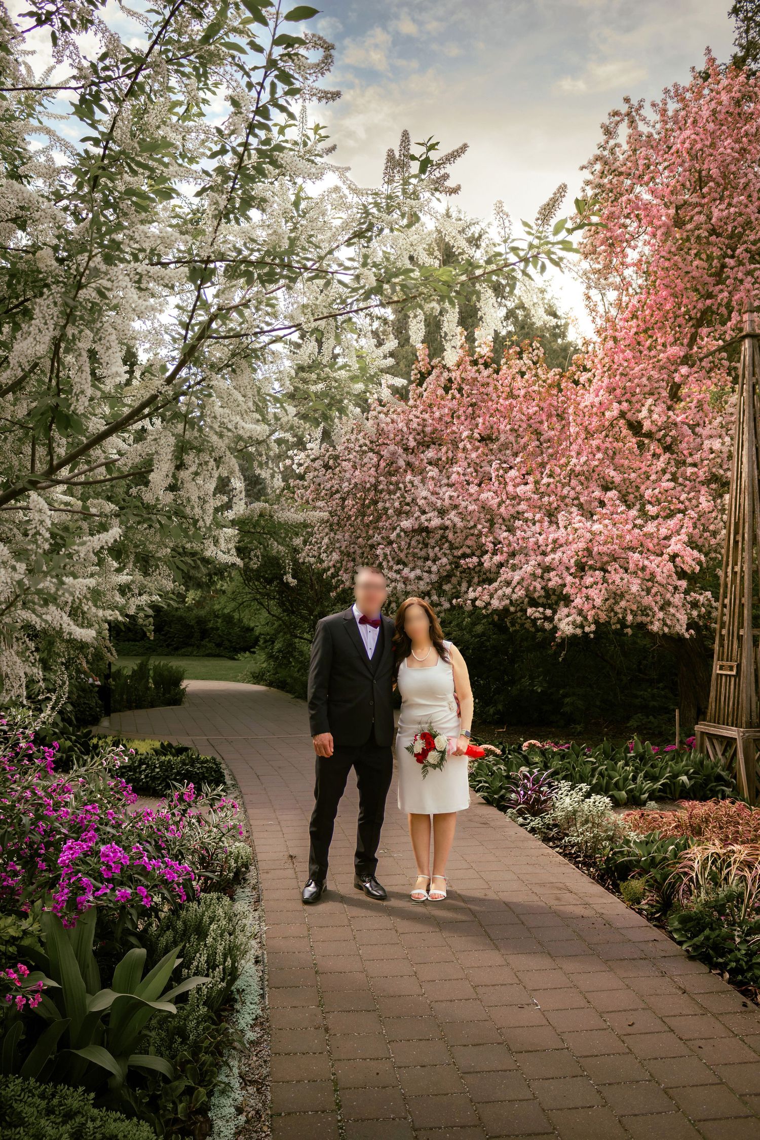 couple posing in a garden